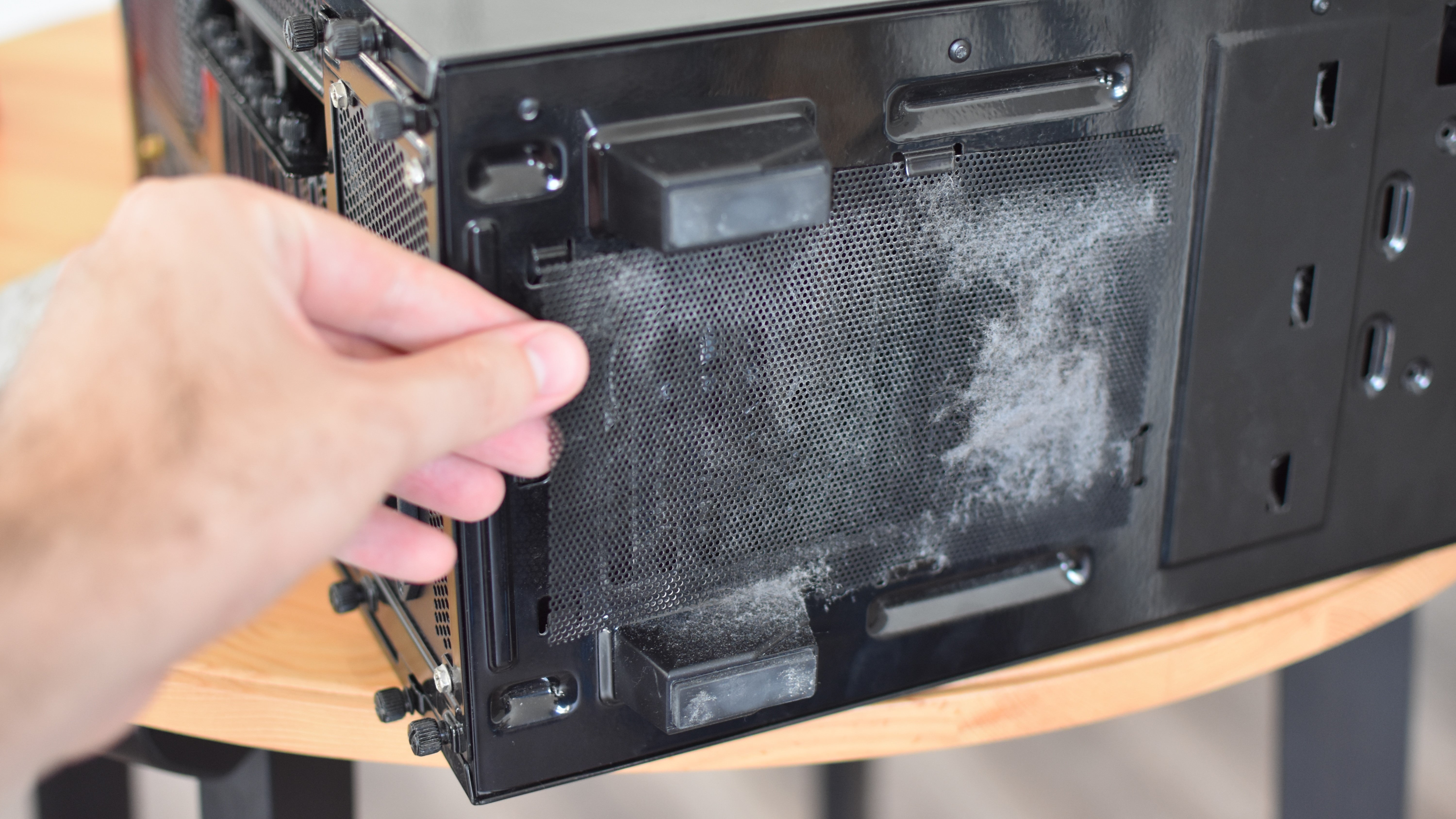 An image of a dirty PC case dust filter.