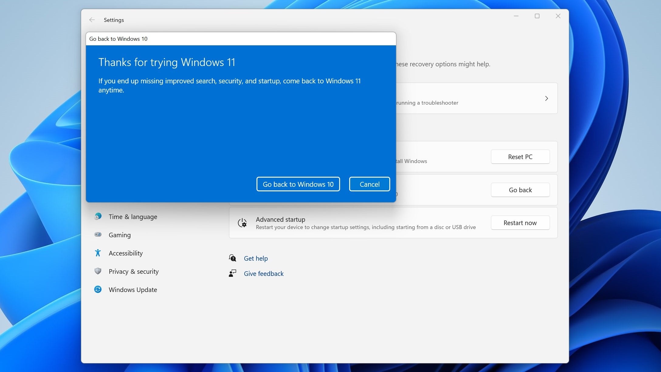 Windows 11 благодарит пользователя перед тем, как предложить кнопку для отката к Windows 10.