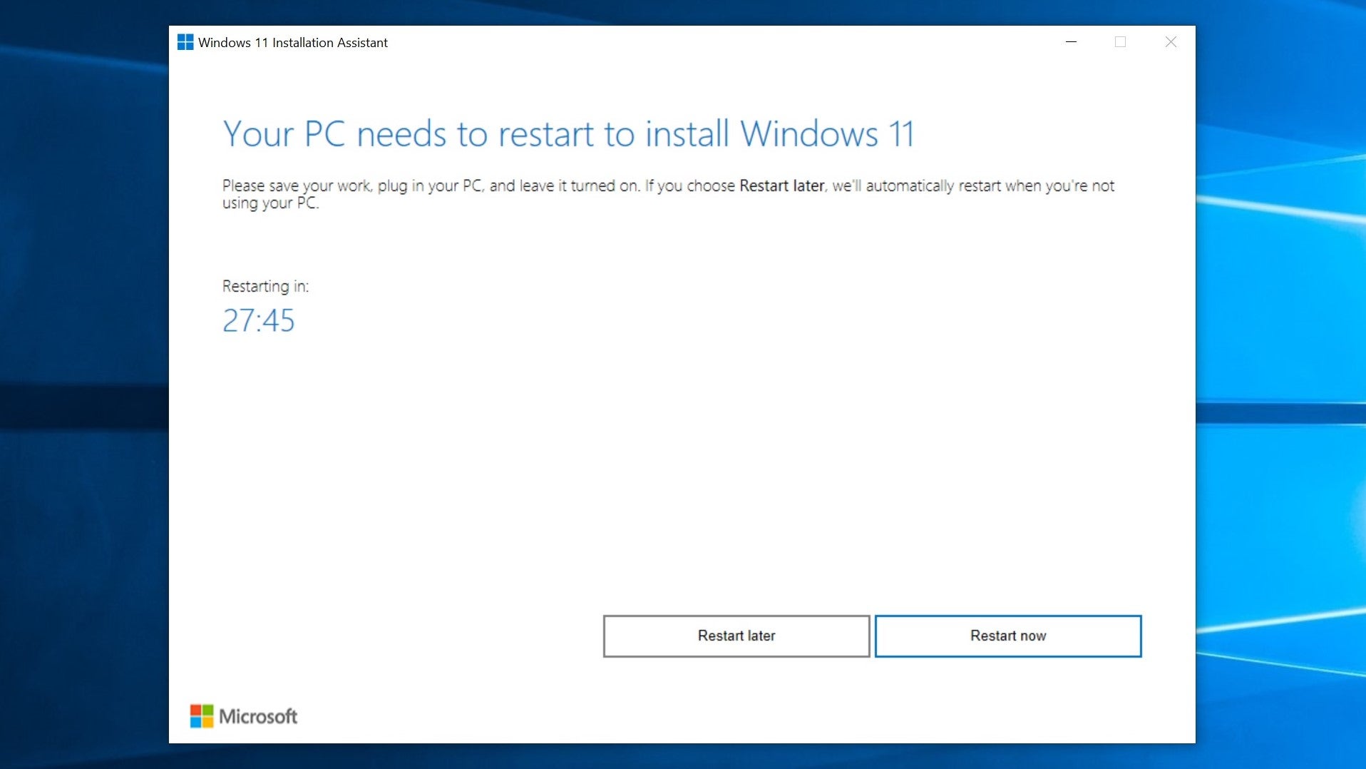 The Windows 11 Installation Assistant, counting down to an automatic restart.
