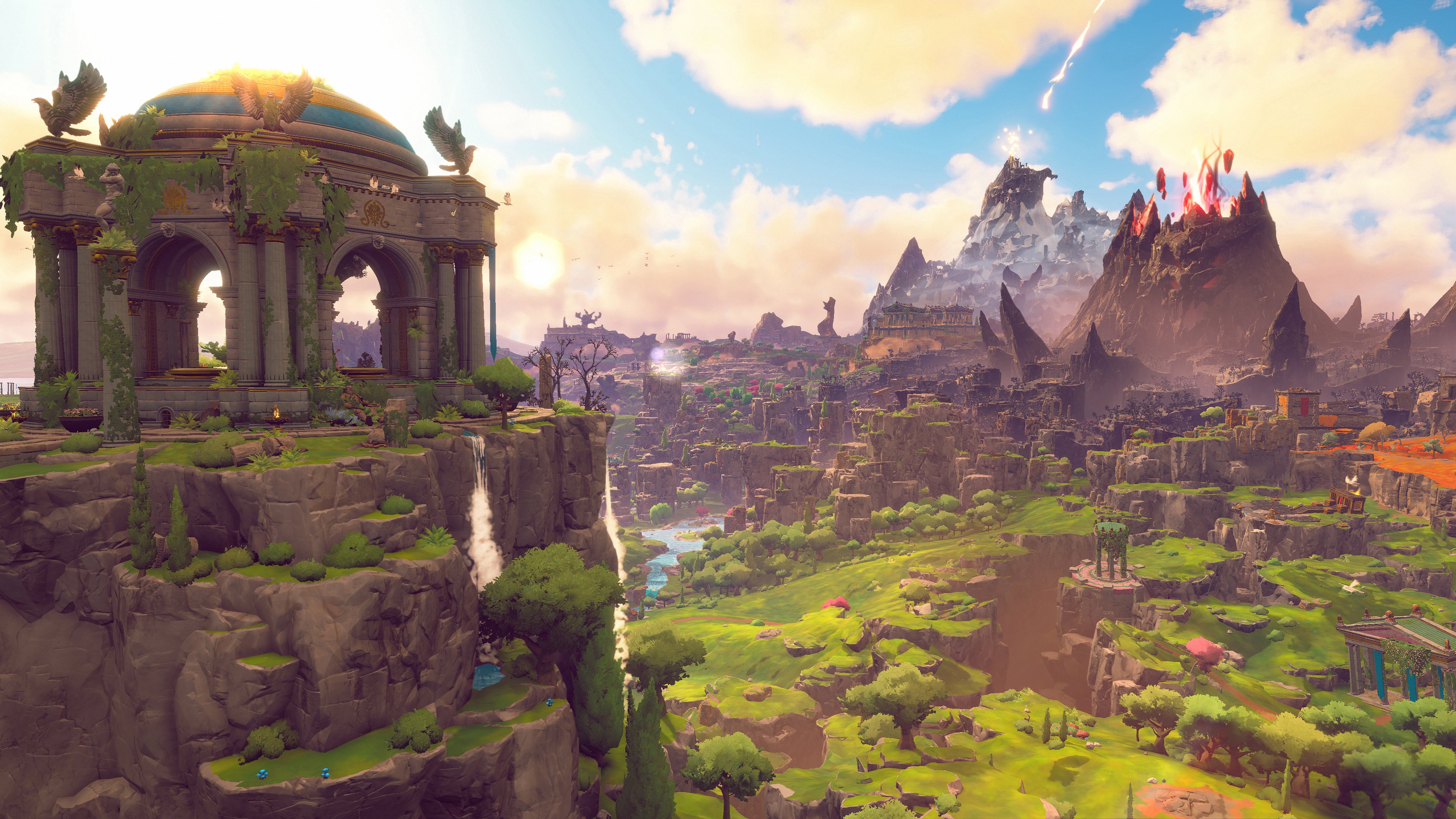 An establishing shot of part of the Golden Isle in Immortals Fenyx Rising, with the Hall of the Gods in the foreground on the left, and the volcano of the Gates of Tartaros on the right.