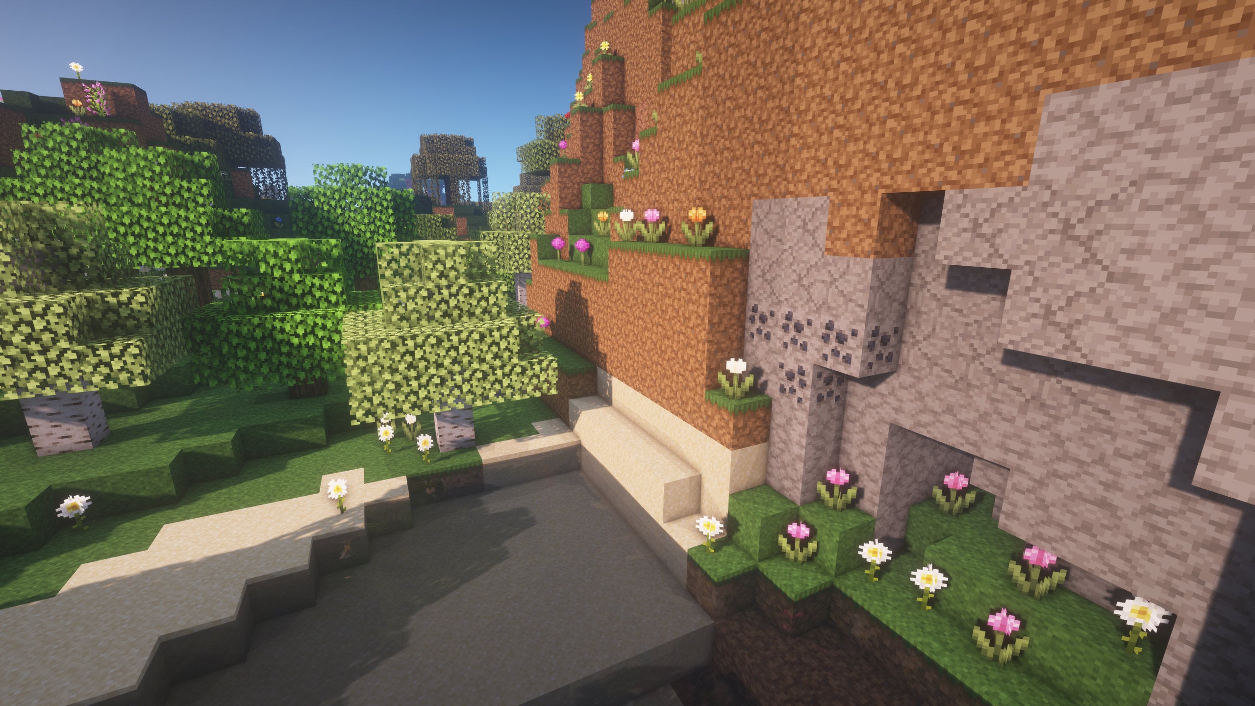 A Minecraft screenshot of a landscape displayed using the Jicklus Texture Pack.