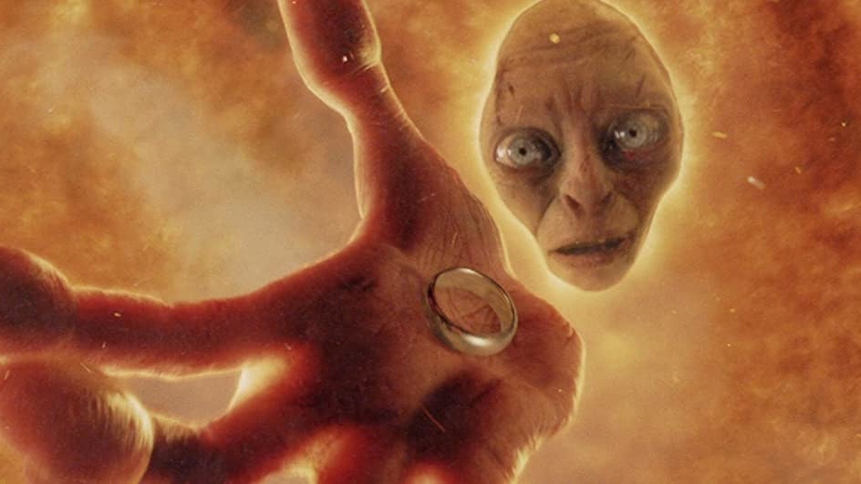 Gollum sinks into lava holding the ring in The Lord of the Rings: Return of the King.