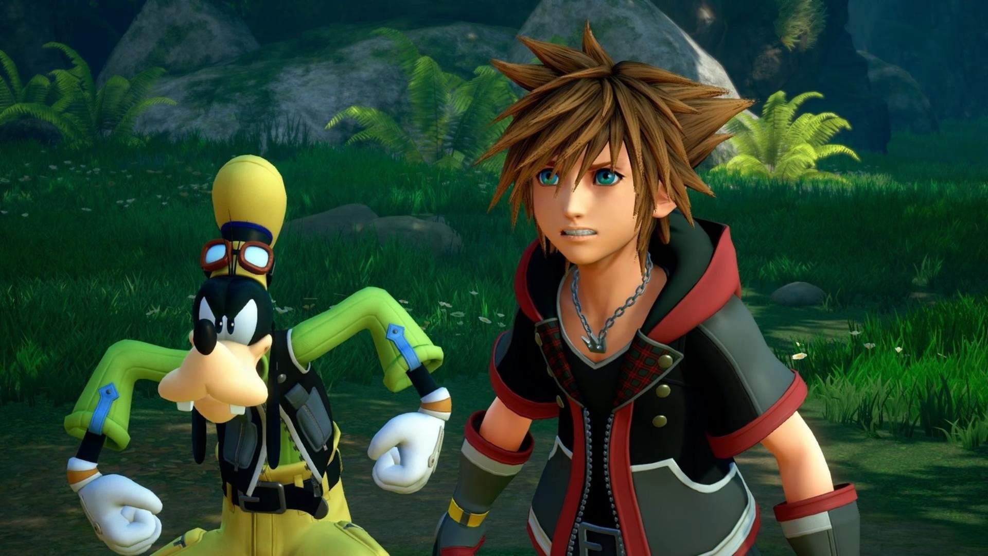 Goofy squares up like a tough guy with Sora next to him.