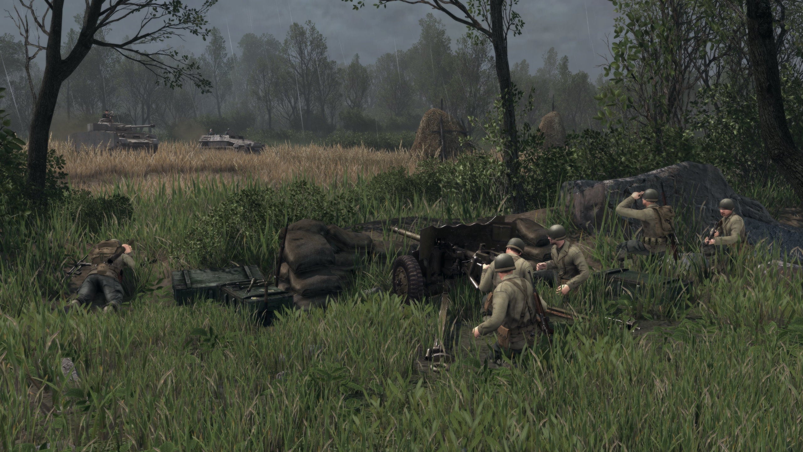 Soldiers lie in wait to ambush tanks in Men Of War 2