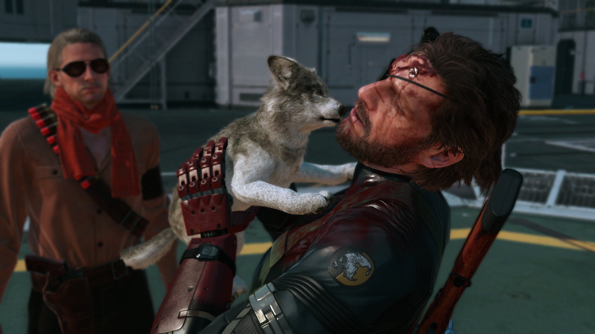 Venom Snake licked by a wolf puppy in a Metal Gear Solid V screenshot.