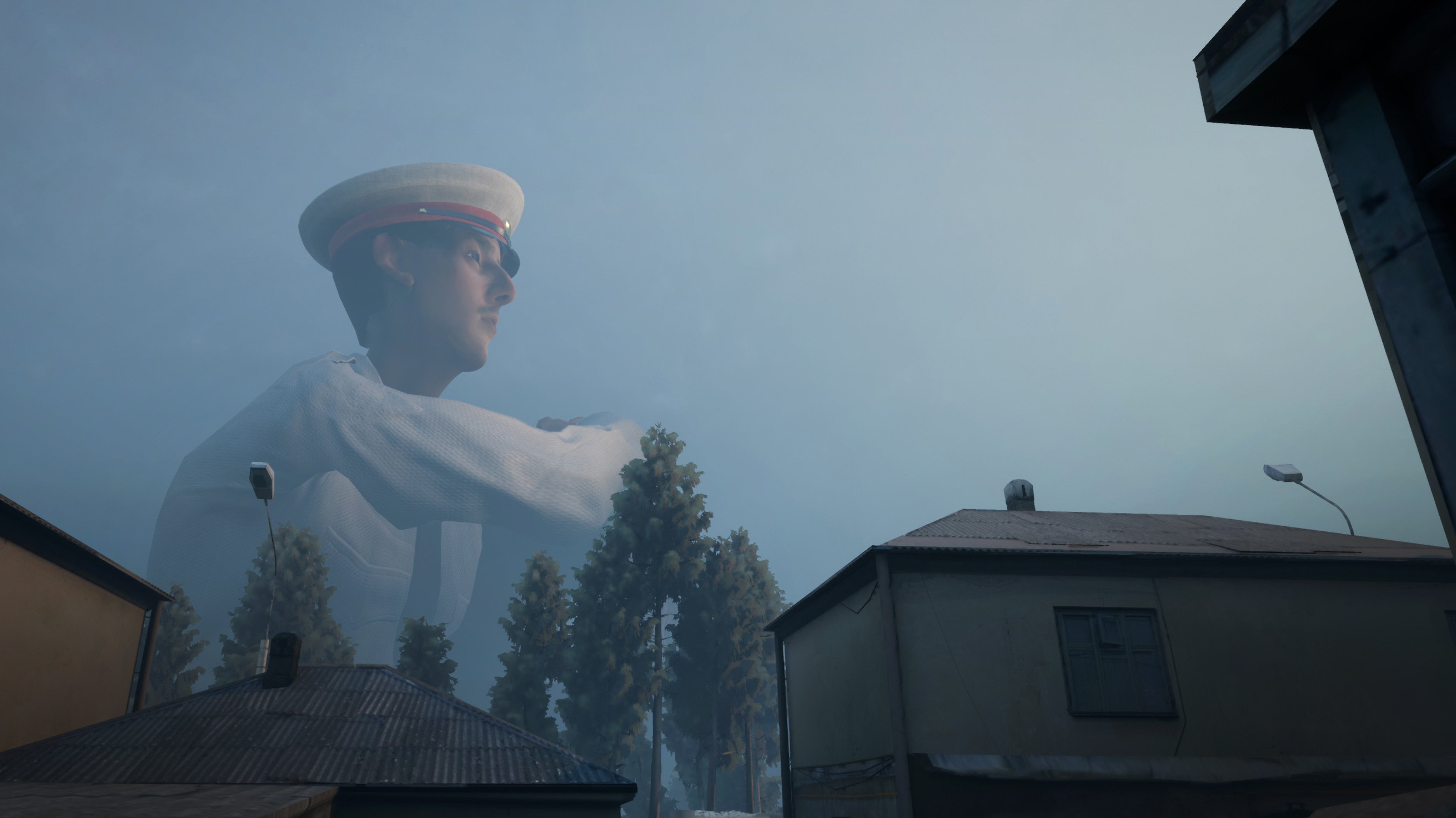 A giant policeman sits behind a town in a Militsioner screenshot.