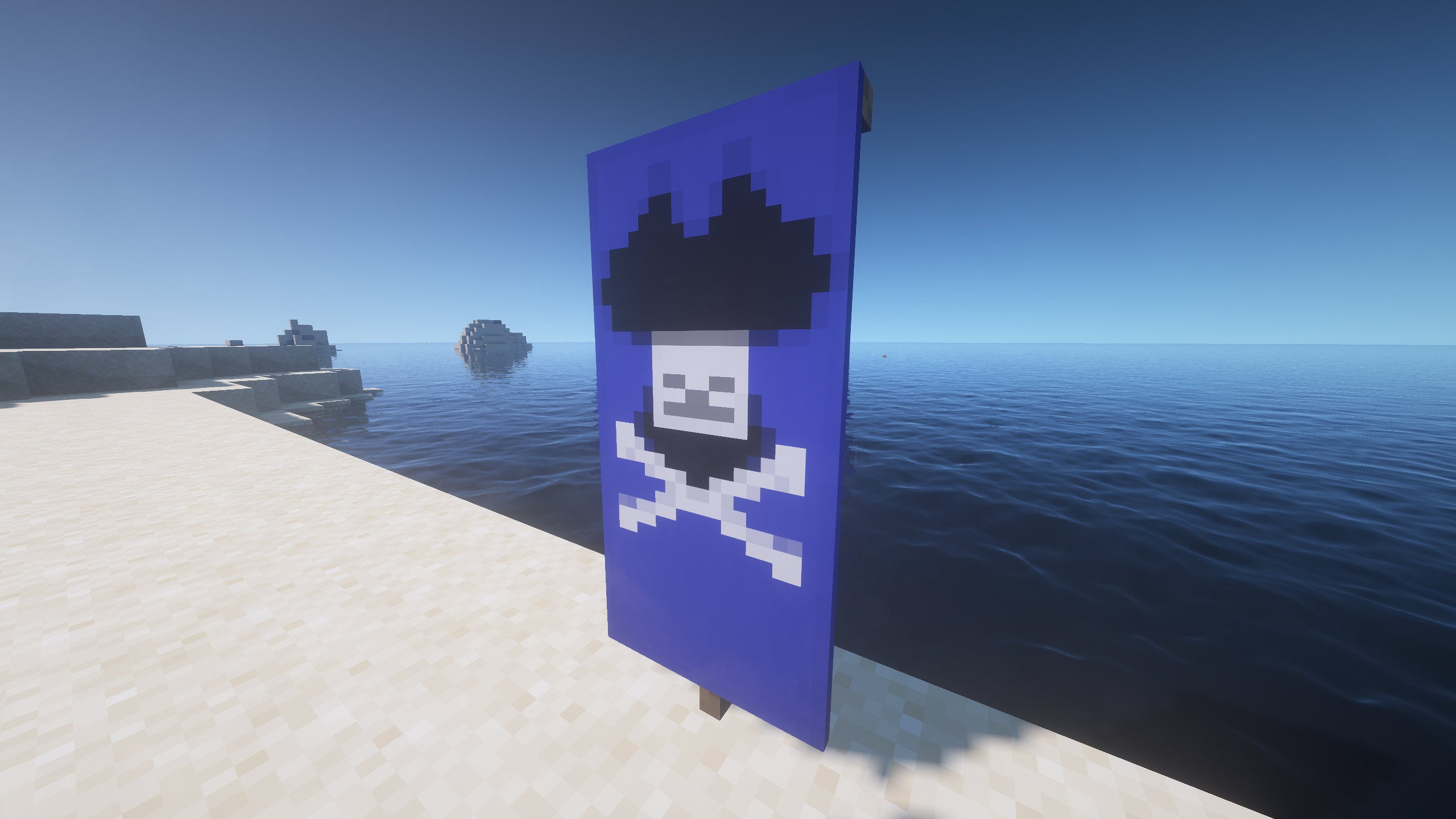 A Pirate Banner in Minecraft, placed in the ground by the coast.