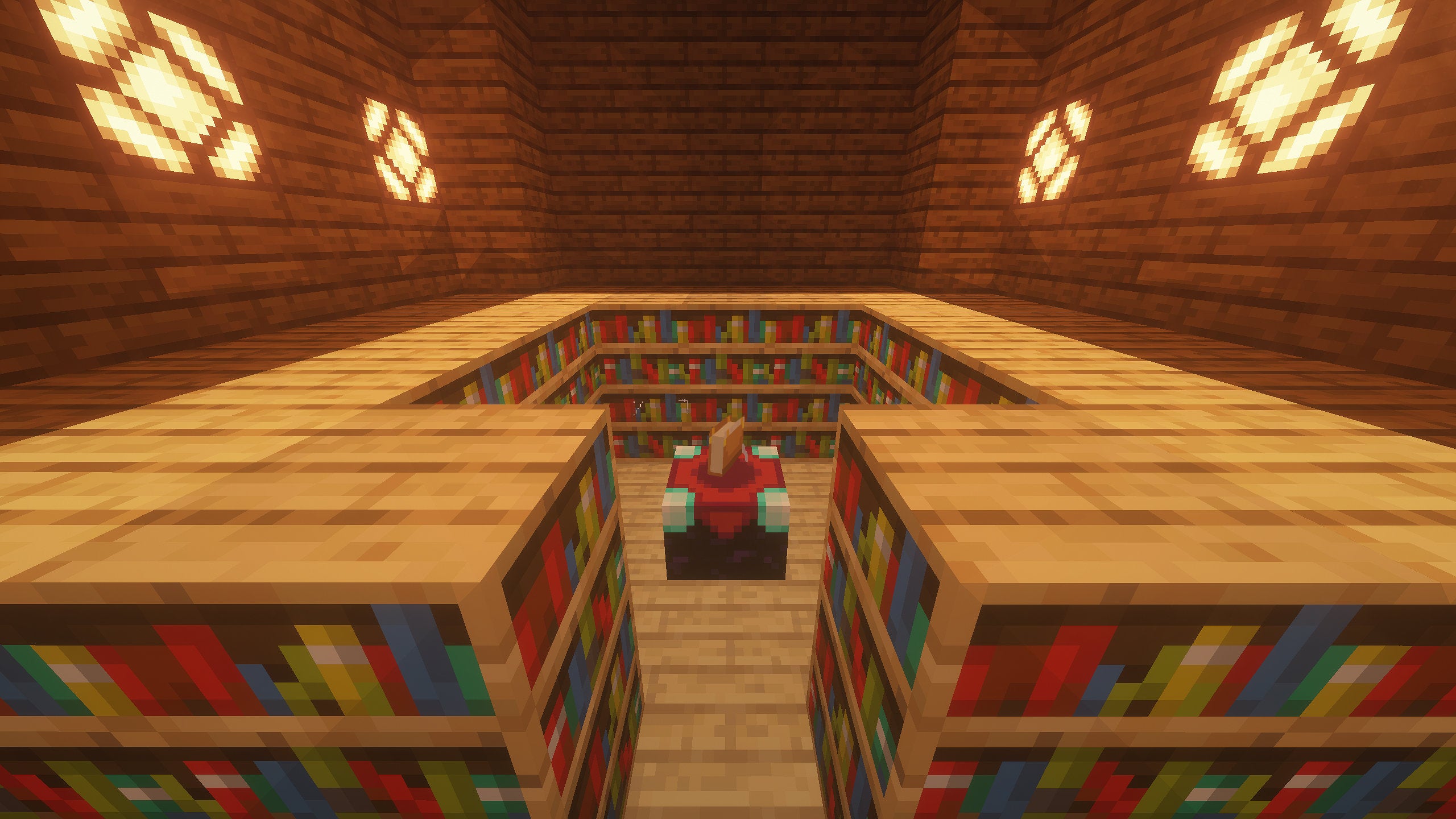An enchanting room in Minecraft consisting of an enchanting table surrounded by bookshelves.
