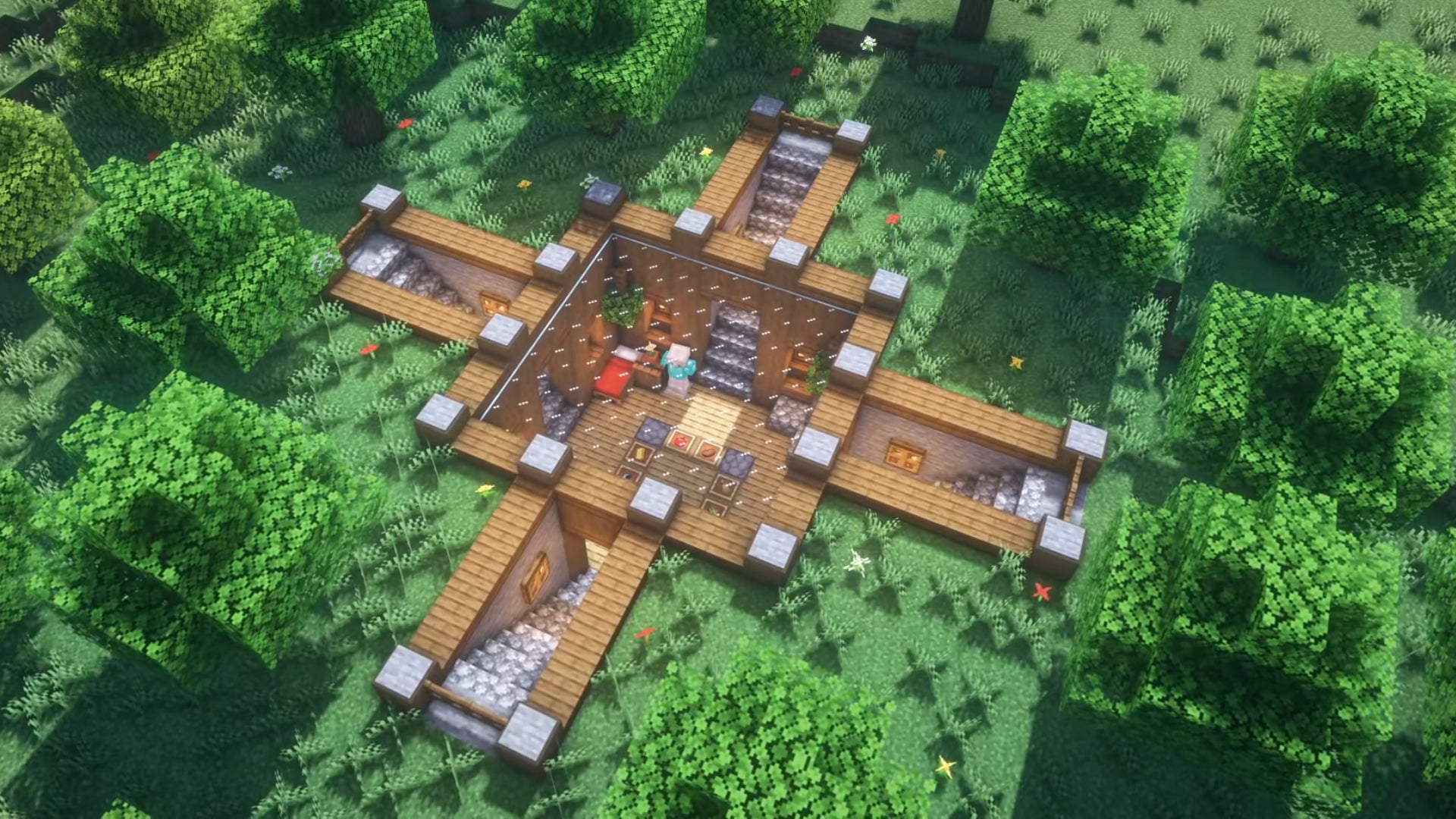 Le sommet d’une maison souterraine dans Minecraft disposé en forme d’un signe plus, construit par le YouTuber Folli.