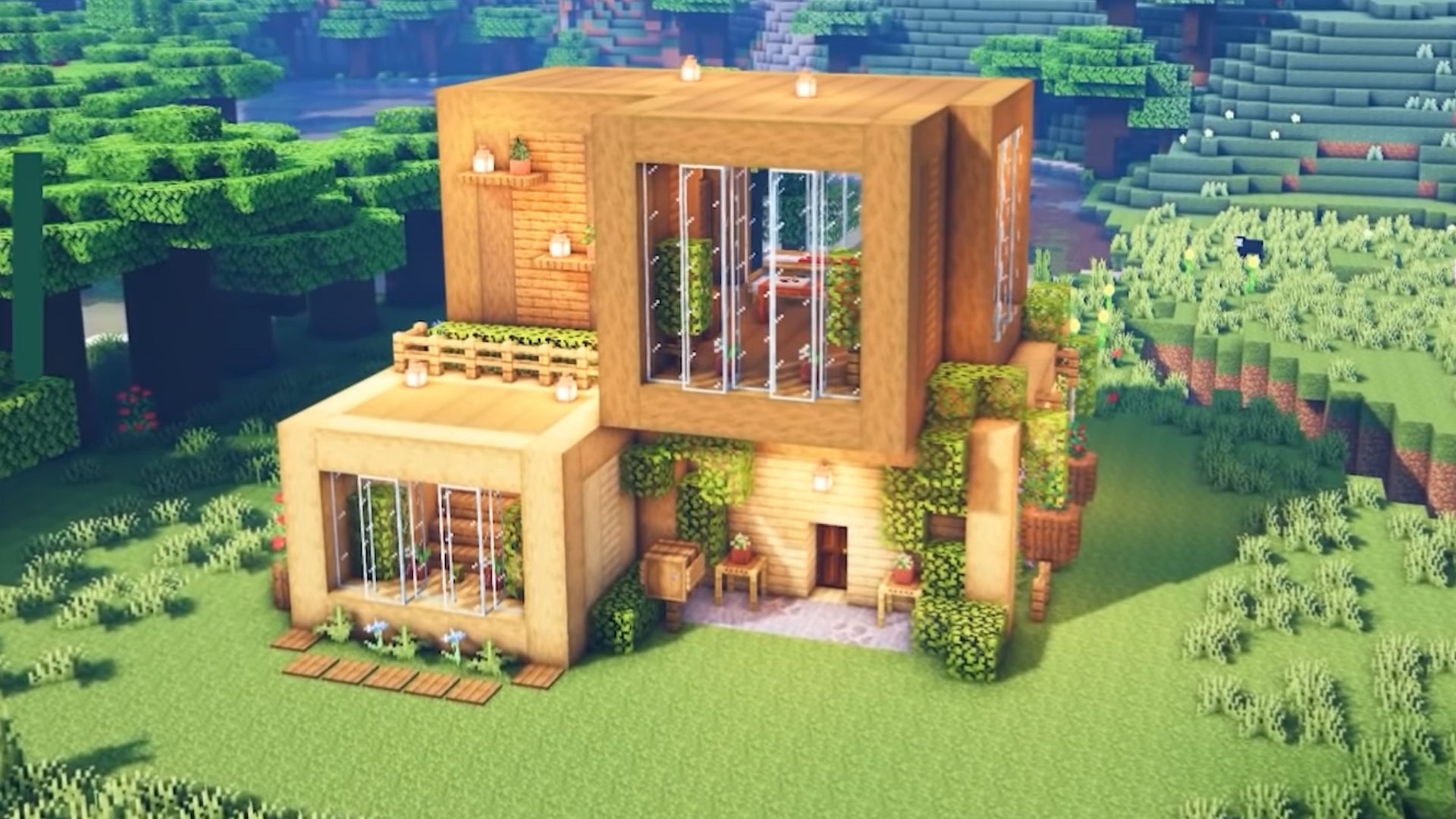 A two-story wooden house in Minecraft, built by YouTuber SheepGG.