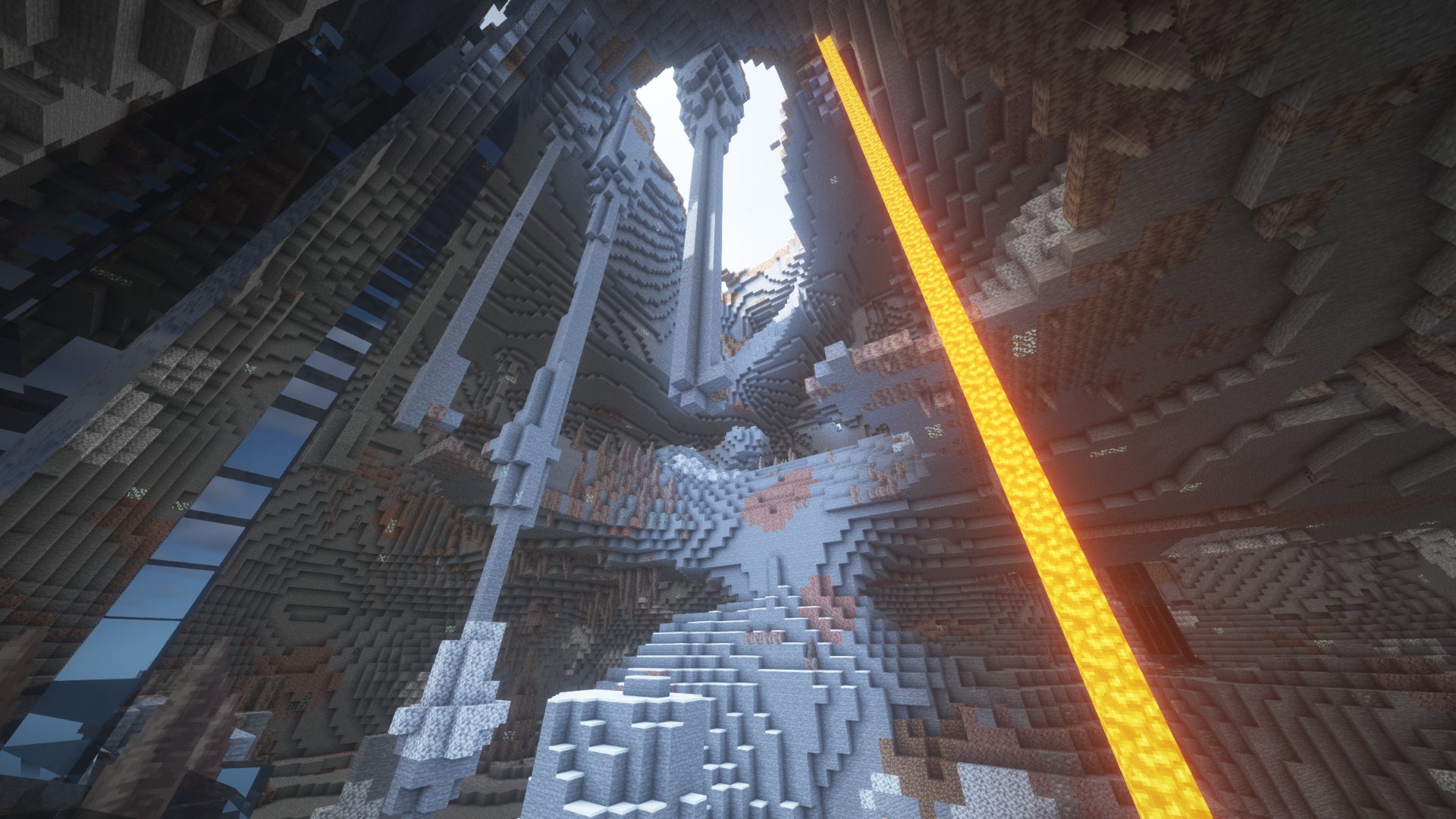 The view from the bottom of a Minecraft cavern, looking upwards at the sunlight emanating from the cave opening above.
