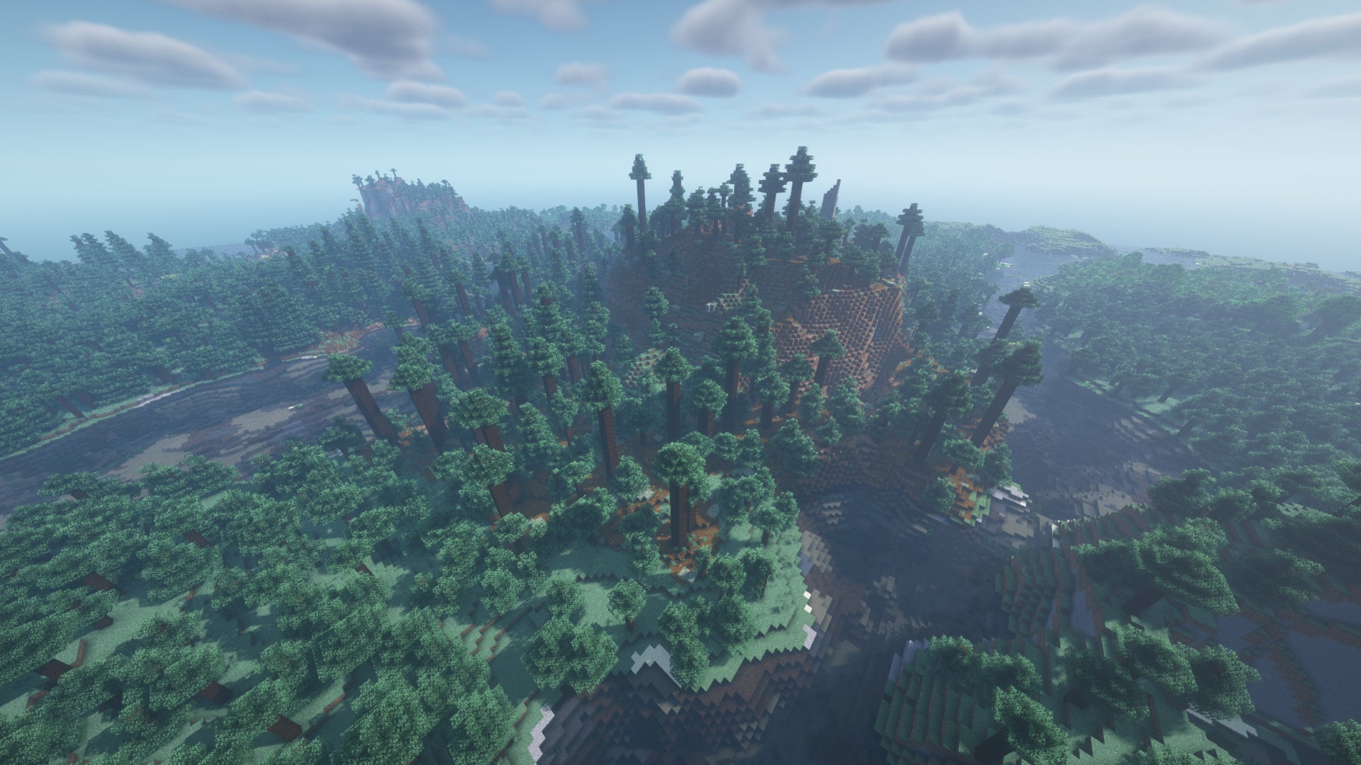 Un paysage Minecraft de la vieille taïga des pins, avec une grande colline entre deux rivières.