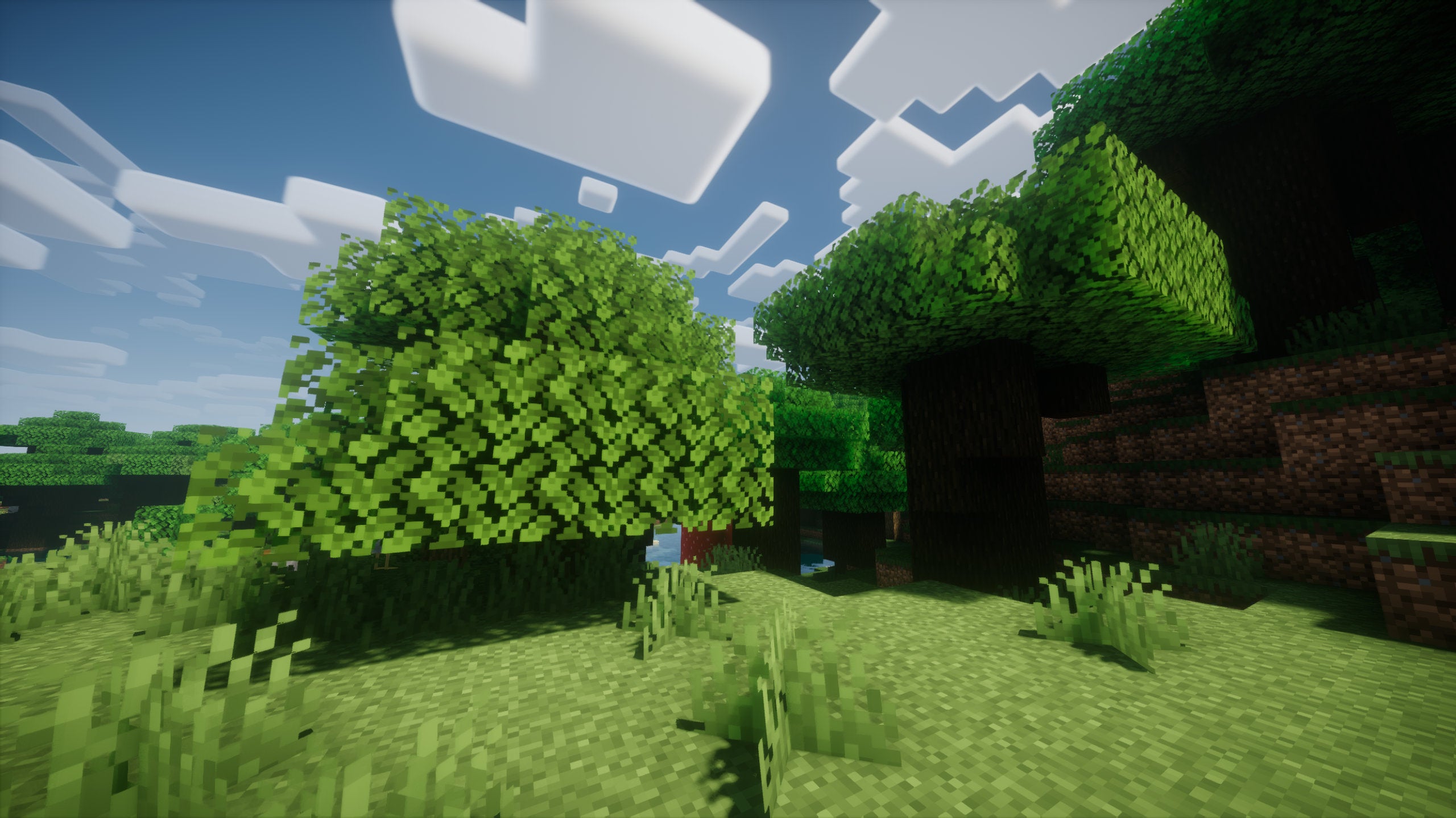 Two Minecraft trees side-by-side in a plains biome.