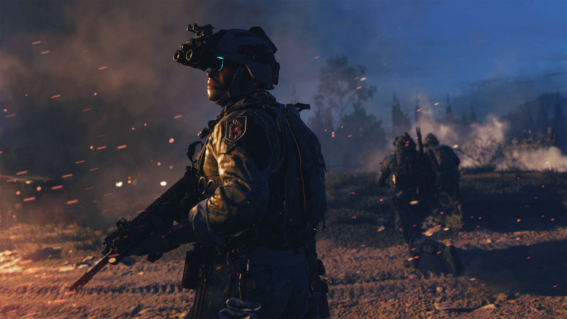 A soldier walks through a war-torn battlefield holding his rifle in Modern Warfare 2.