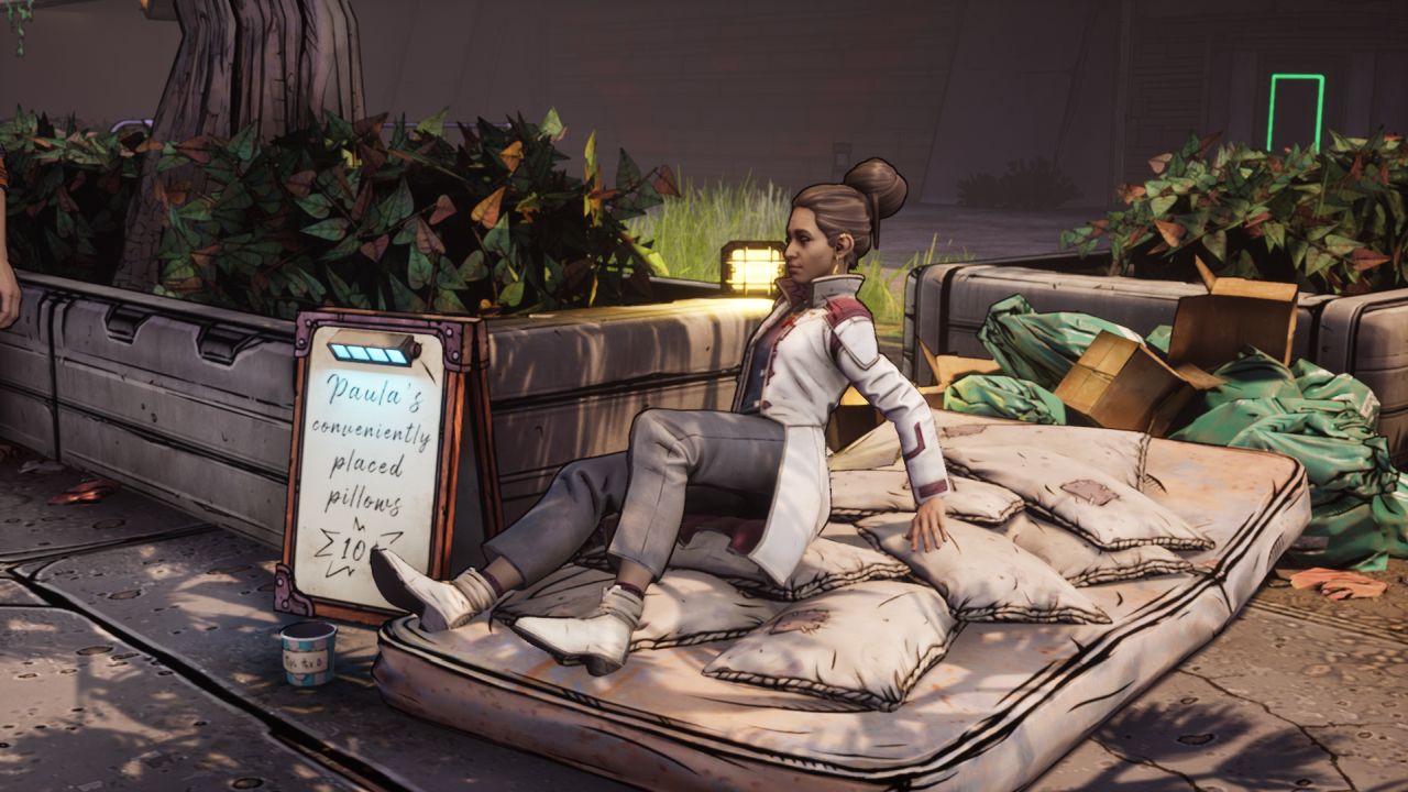 Anu from New Tales From The Borderlands has landed on a matress and pillows, next to a sign saying 'Paula's conveniently placed pillows'