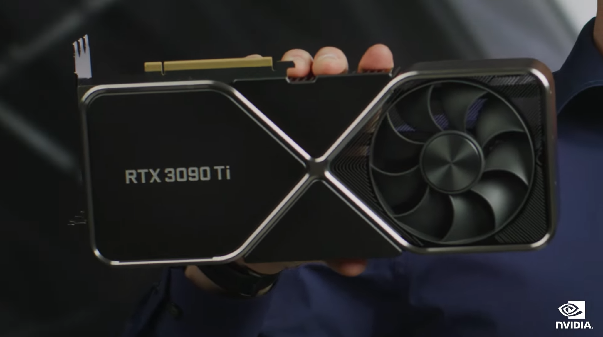 The Nvidia GeForce RTX 3090 Ti being held in a hand.
