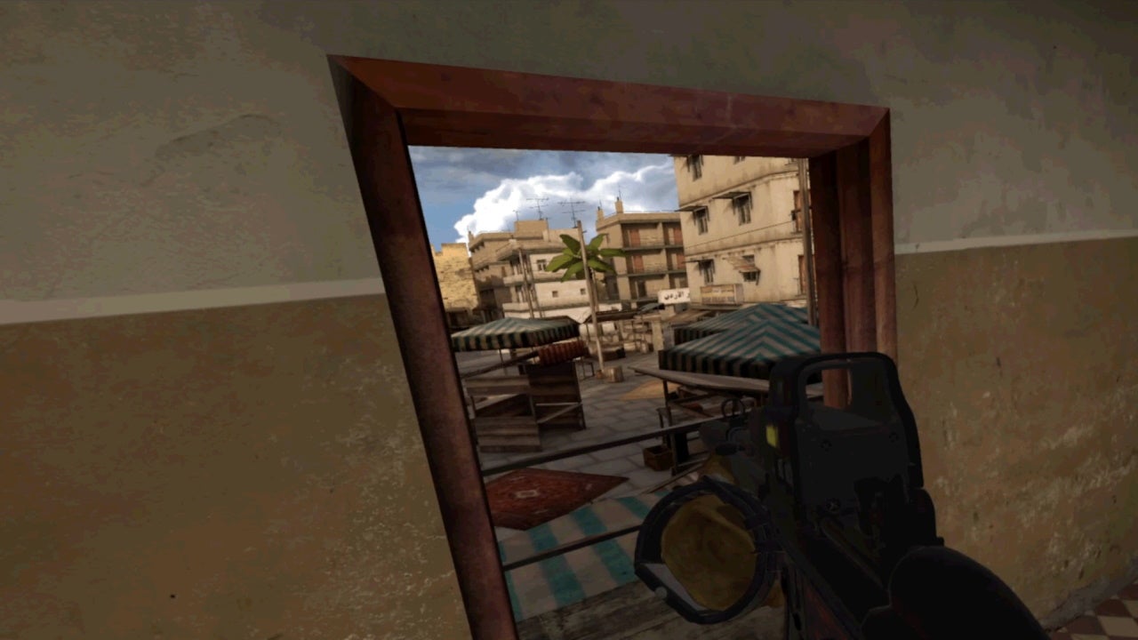 A player aims out of a window in Onward VR.