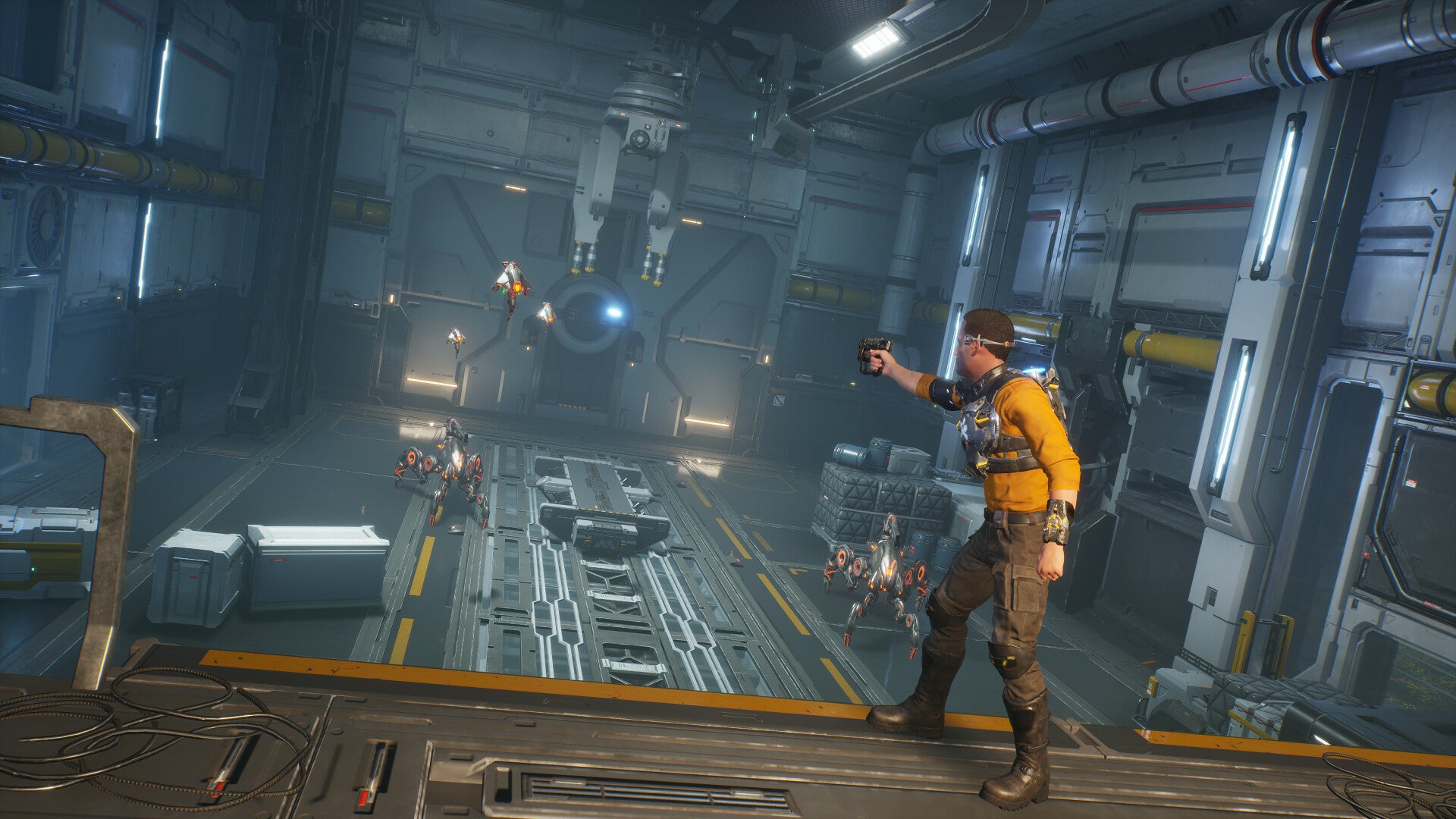 A screenshot of Outcast 2 showing protagonist Cutter Slade aiming at some robots in an indoor scifi environment.
