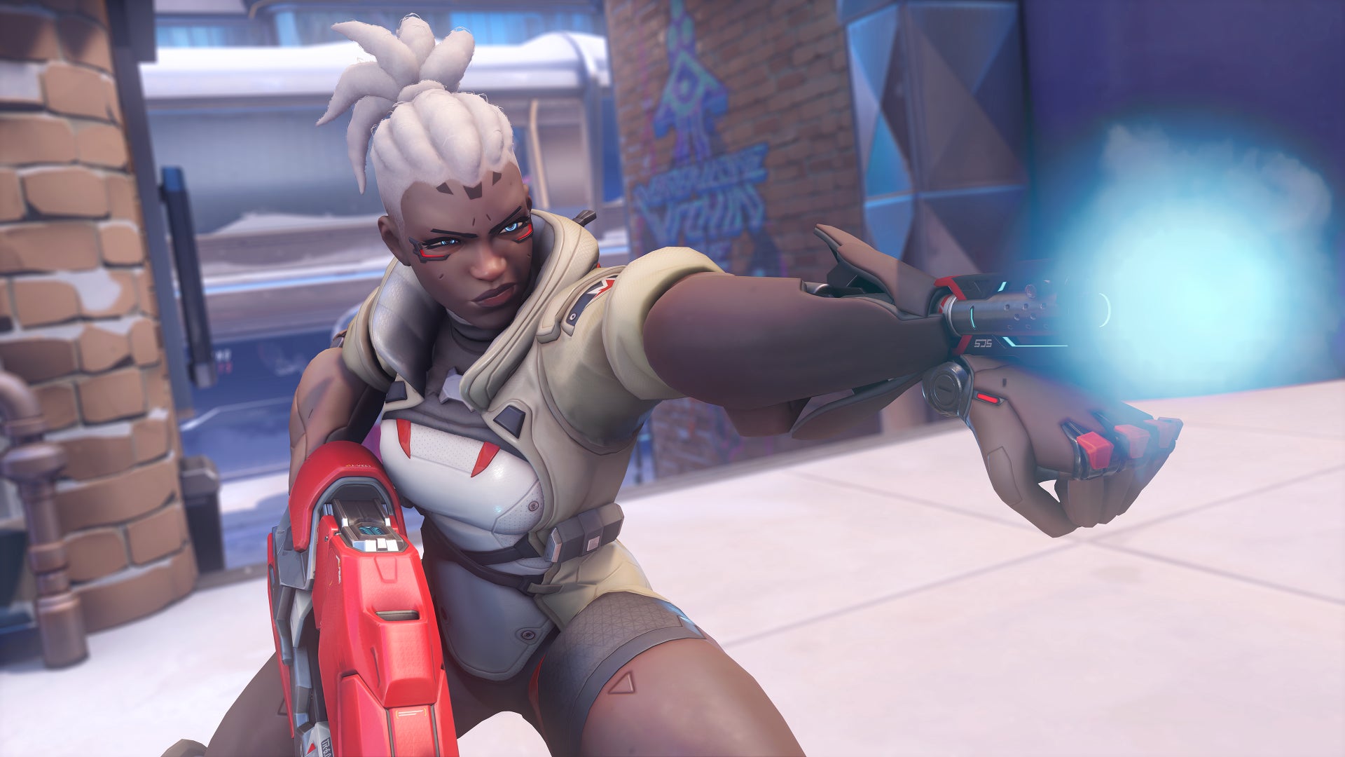 Sojourn, a hero in Overwatch 2, fires a rocket from a launcher in her arm.