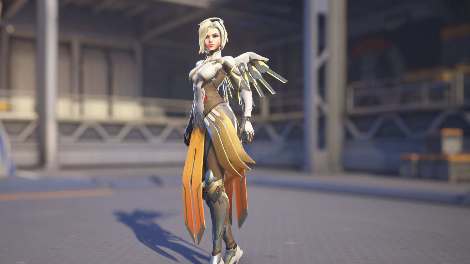 Mercy, a hero in Overwatch 2, poses before the camera in the hero selection screen.