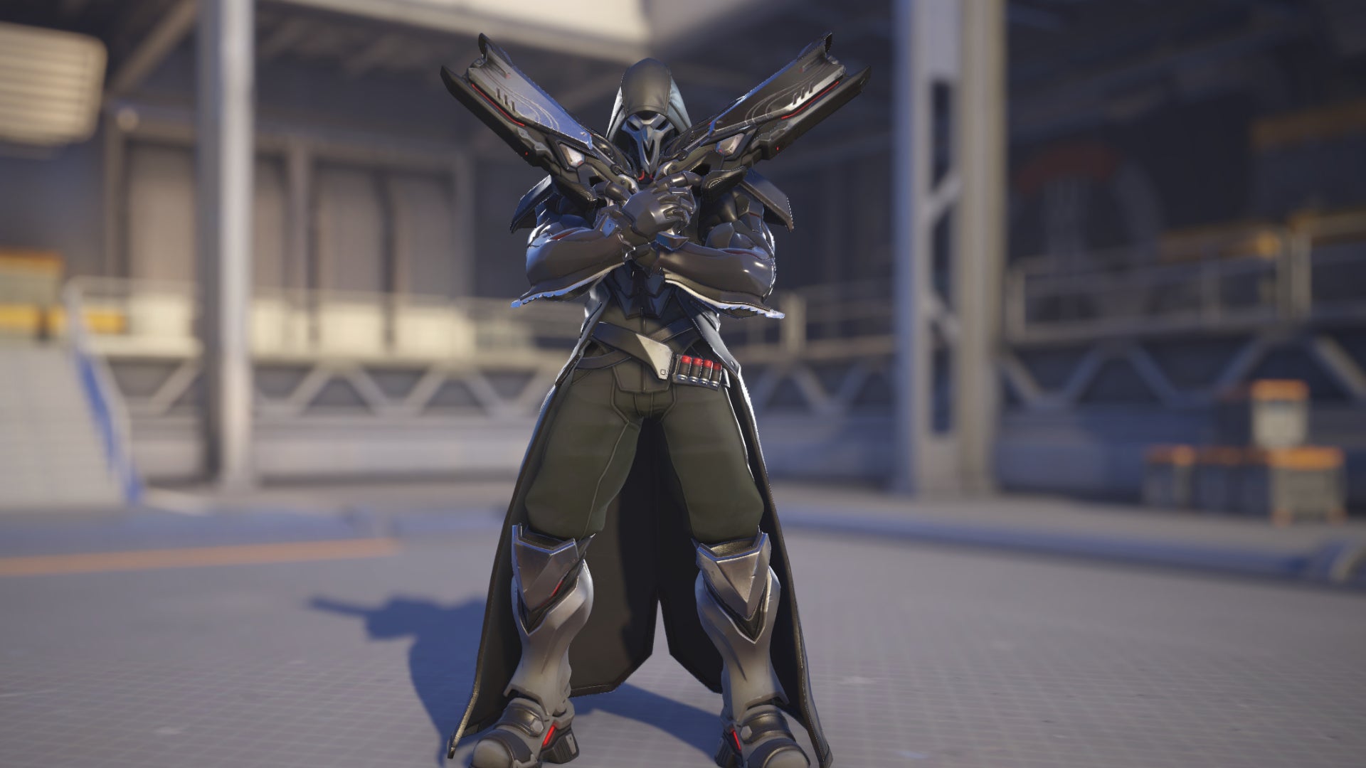 Reaper, a hero in Overwatch 2, poses before the camera in the hero selection screen.