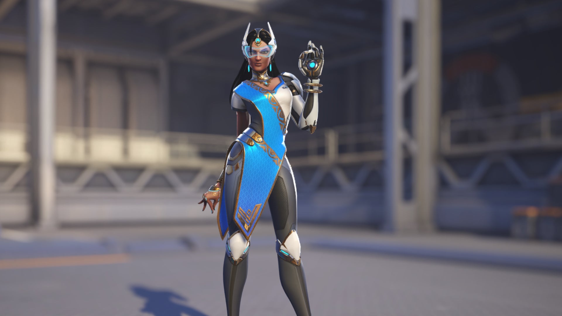 Symmetra, a hero in Overwatch 2, poses before the camera in the hero selection screen.