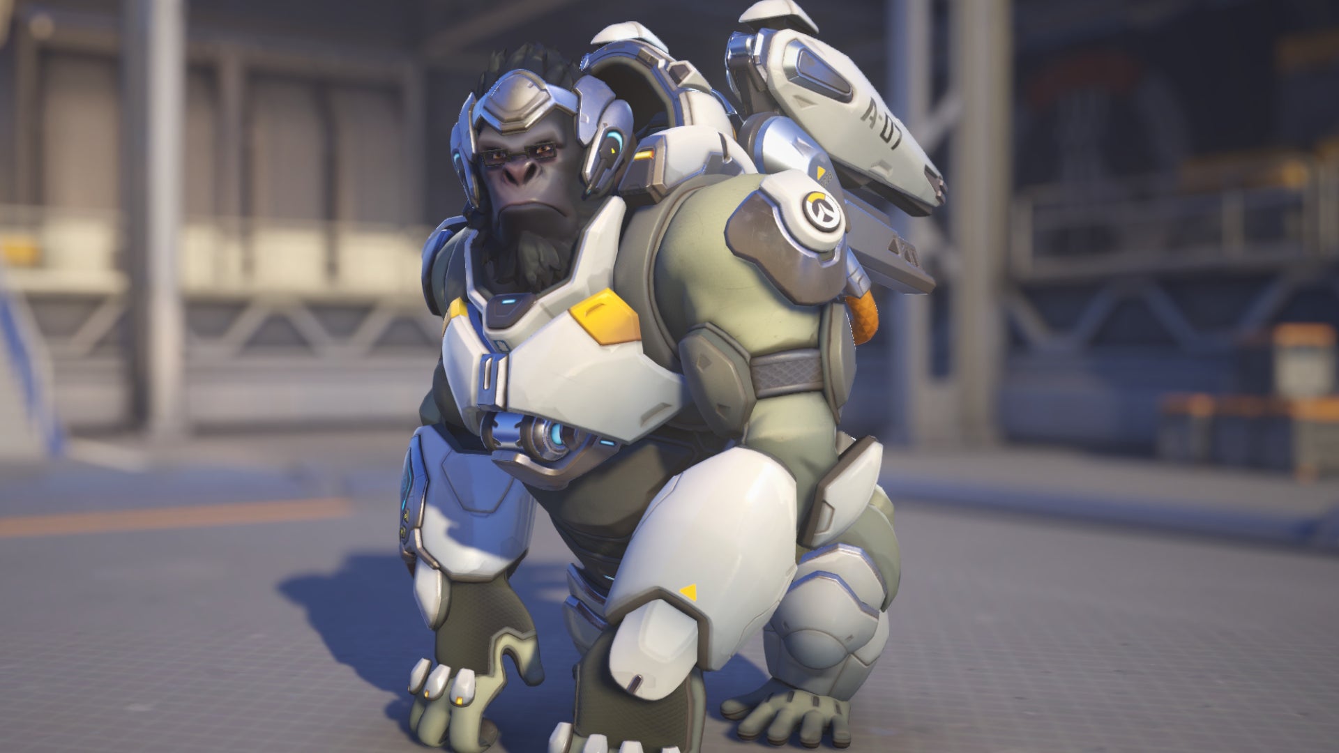 Winston, a hero in Overwatch 2, poses before the camera in the hero selection screen.