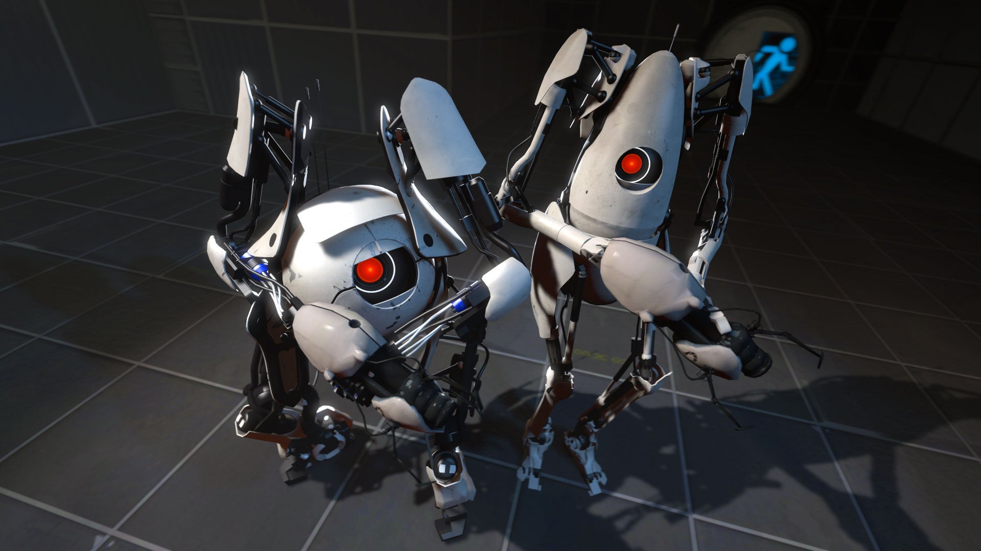 The two robot pals get ready to solve puzzles in Portal 2