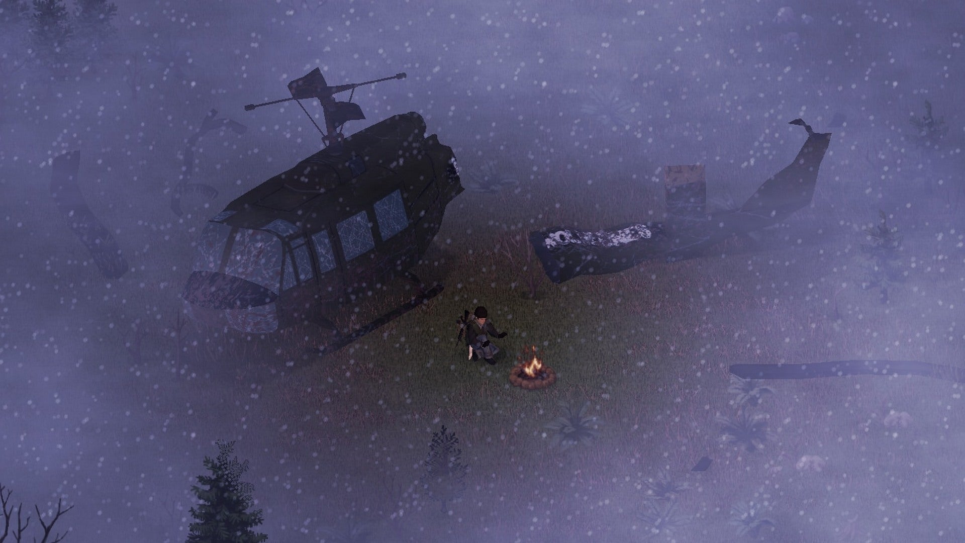 A survivor huddles round a campfire in the snow next to a crashed helicopter in Project Zomboid