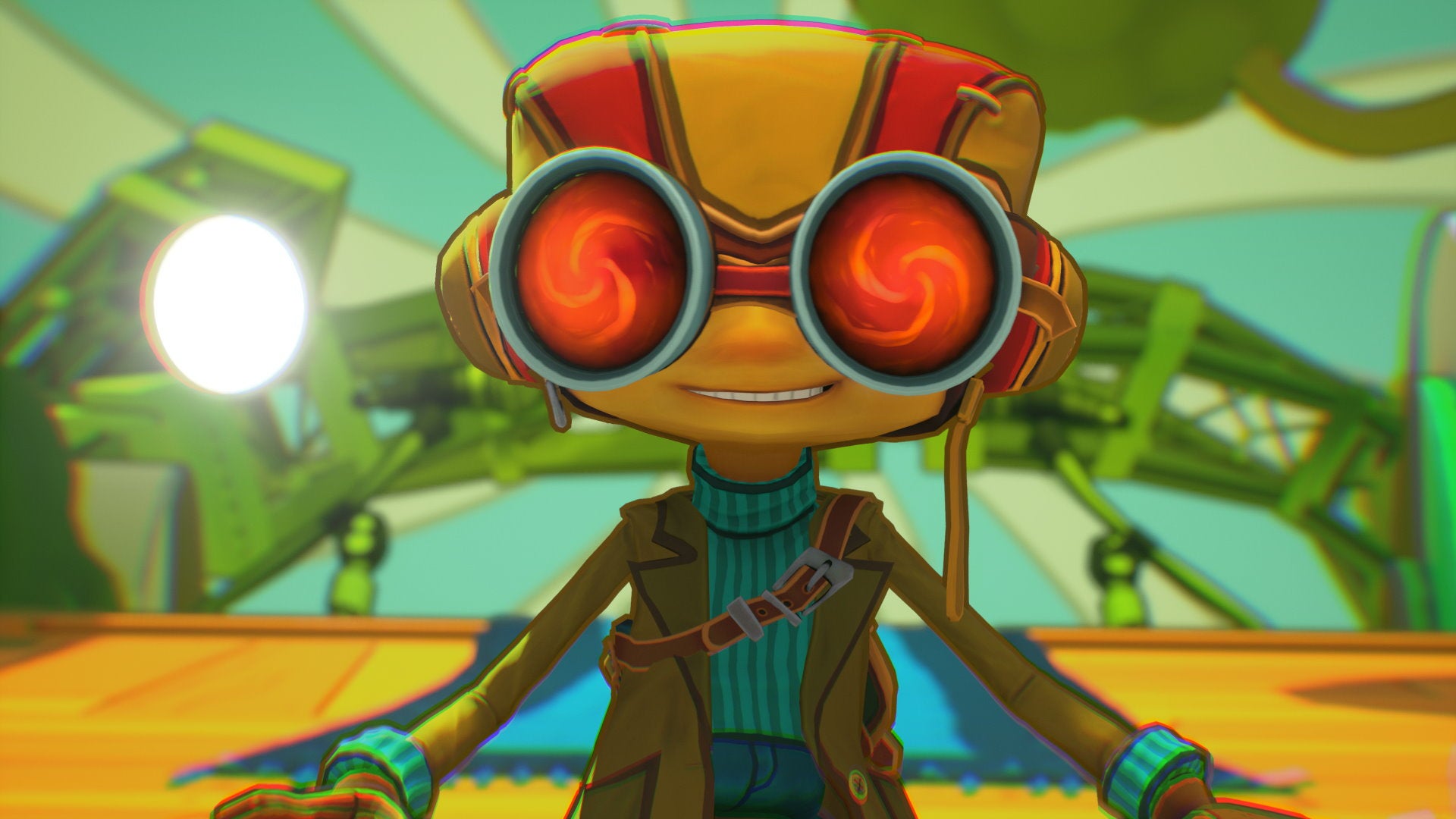 Raz smiles against a colorful background in Psychonauts 2