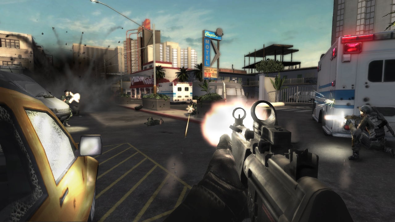 A gunfight outside a motel in a Rainbow Six Vegas 2 screenshot.