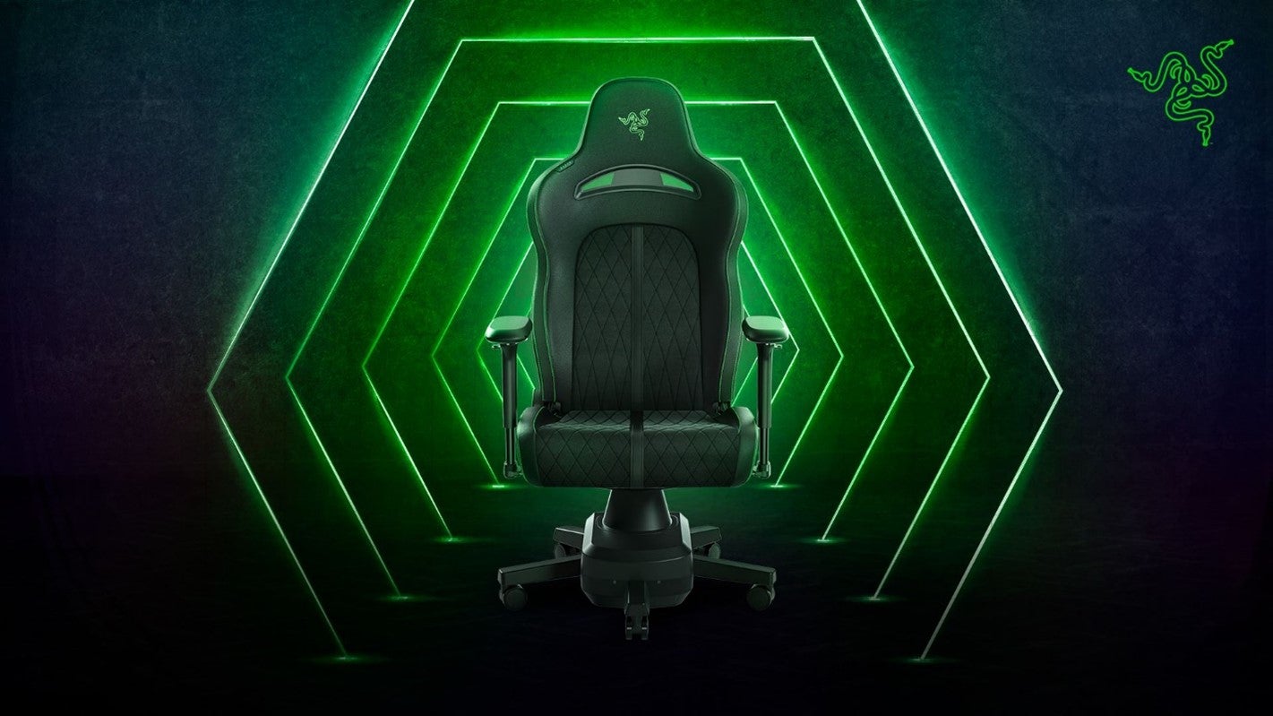 The Razer Enki Pro HyperSense gaming chair against a green and black CG background.