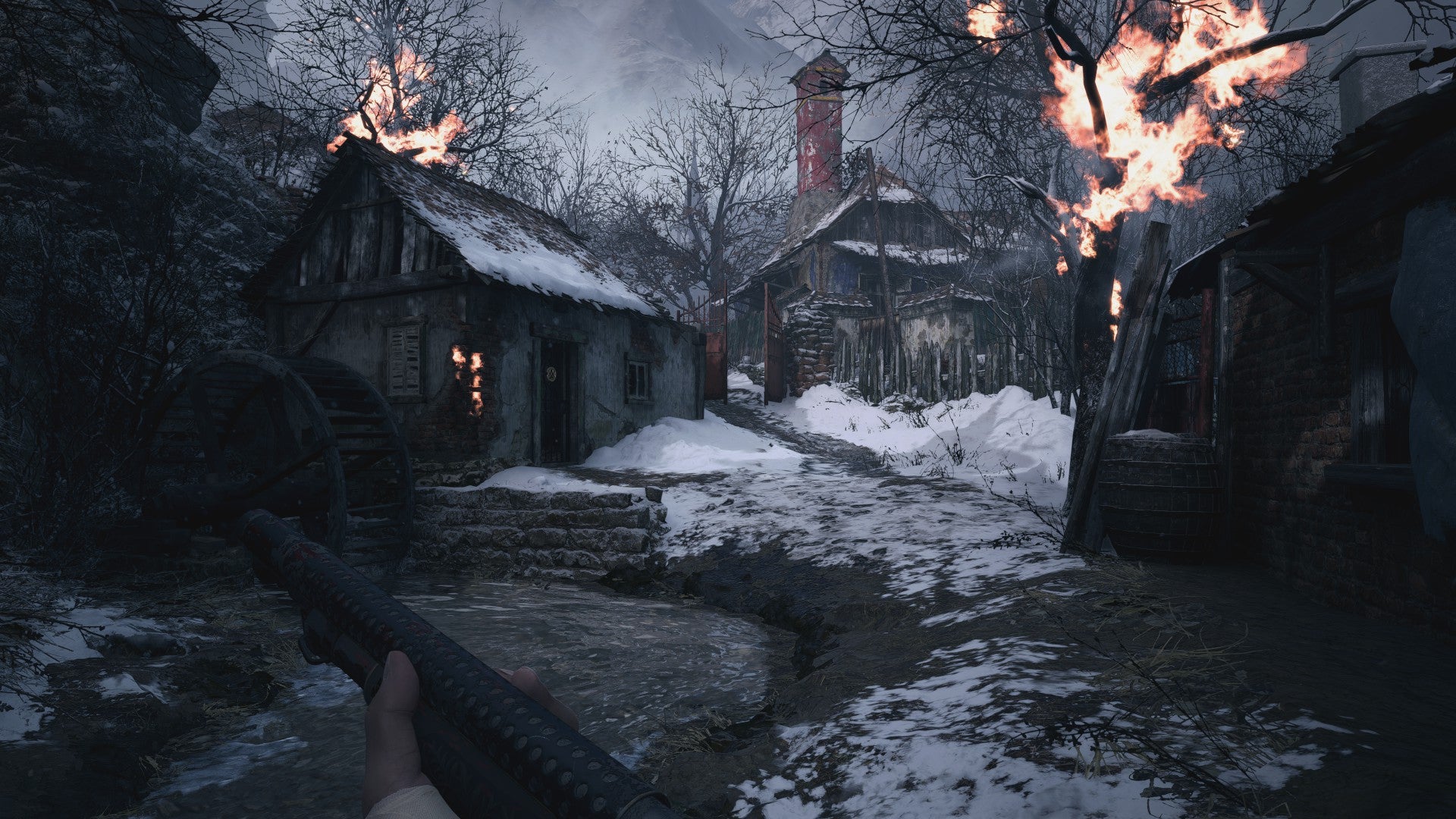 A burning house and tree near a river in Resident Evil Village with ray tracing switched on