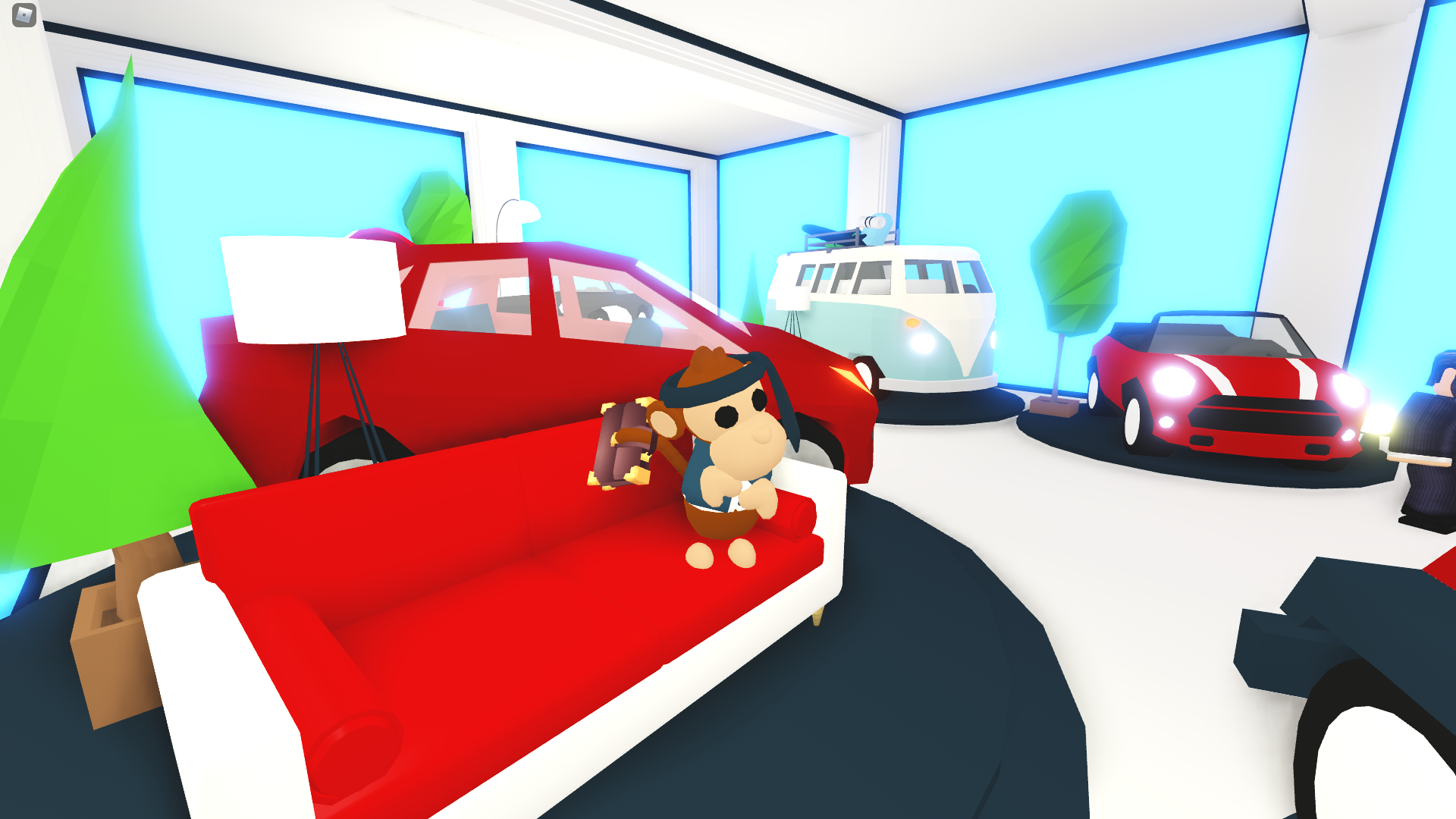 A pet monkey sitting in a car show room in Adopt Me!