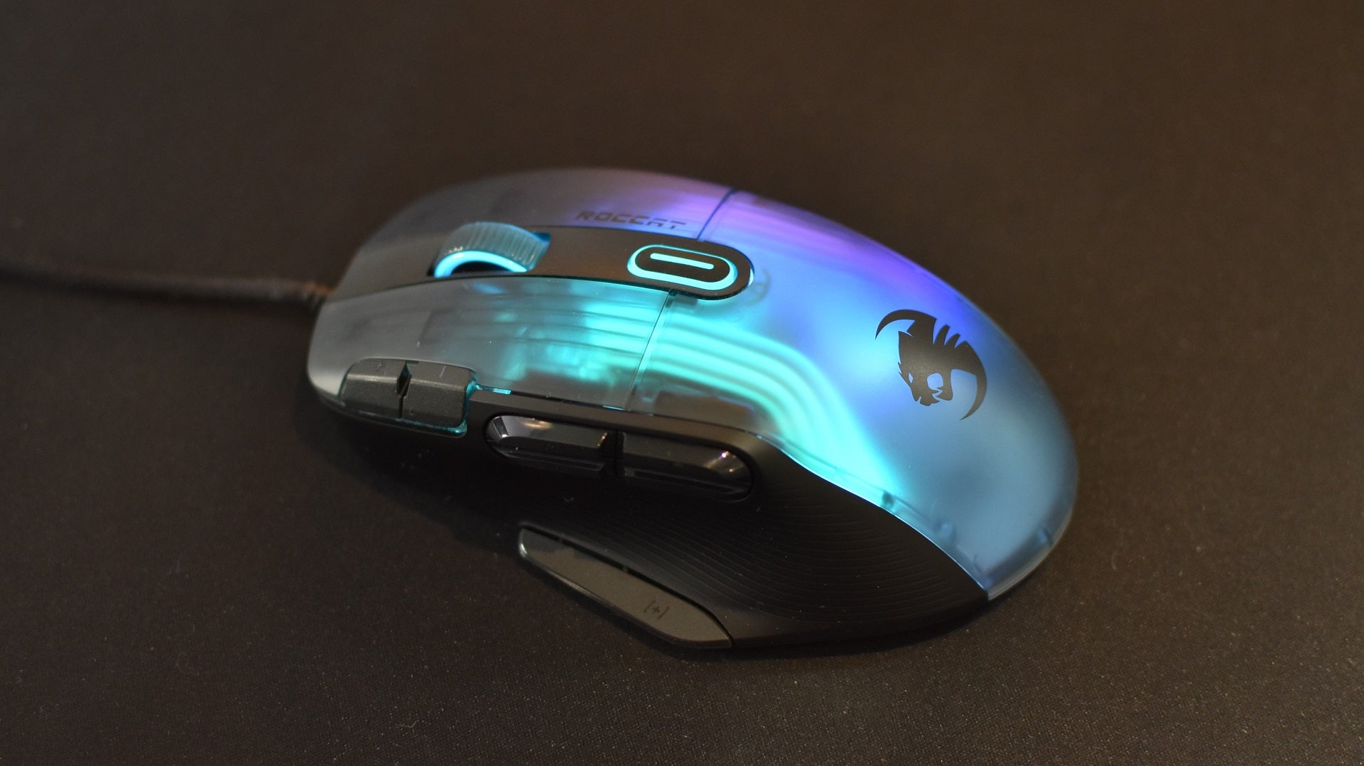 The Roccat Kone XP gaming mouse on a black mousepad.