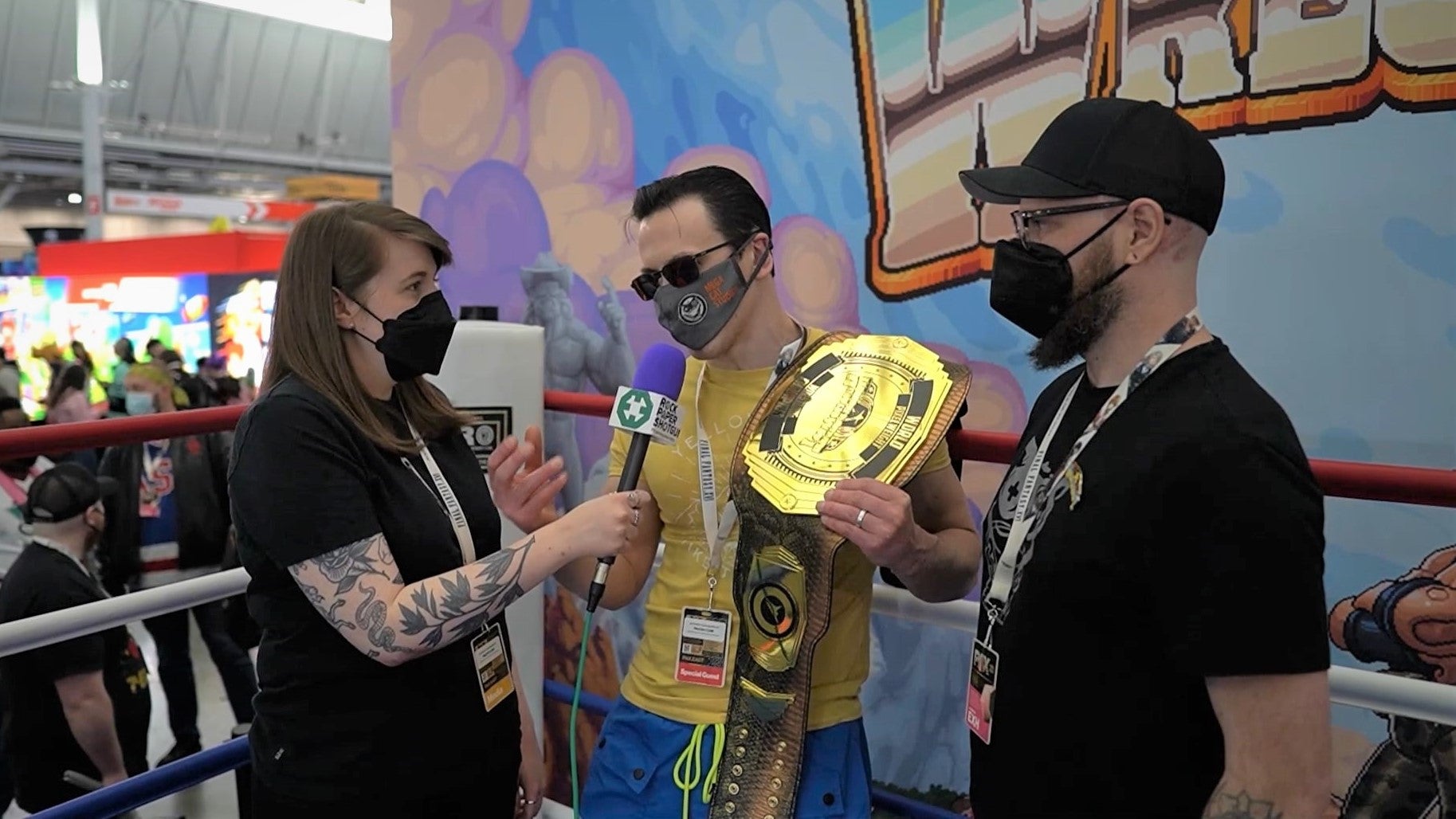 Rachel chats with the developers of WrestleQuest at PAX East