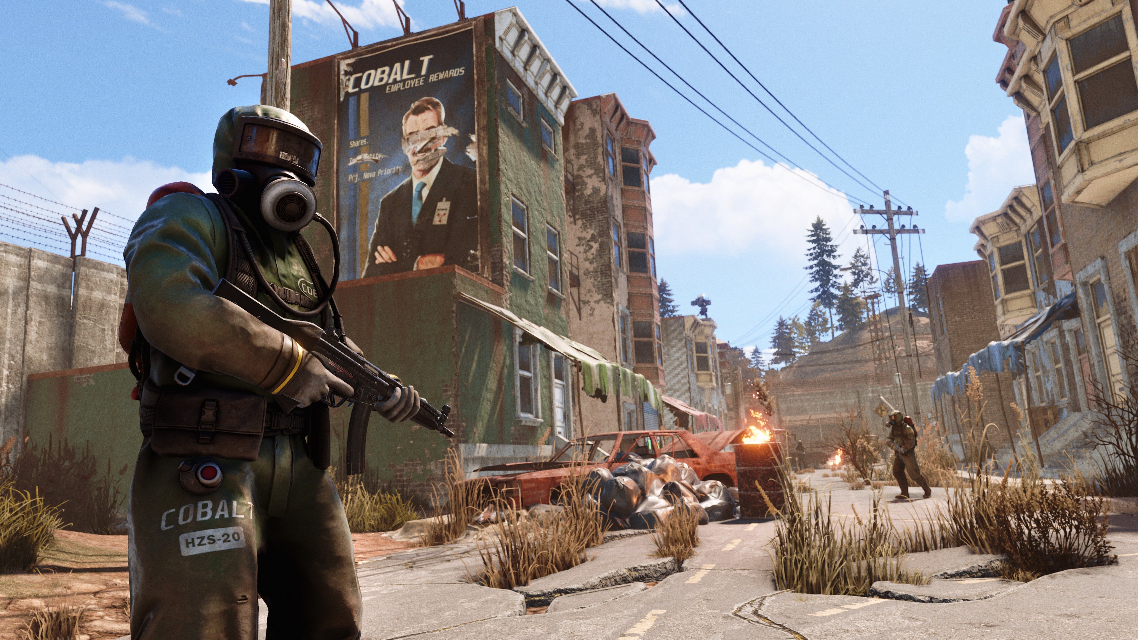 Armed people in hazmat suits stand in a ruined street in a Rust screenshot.