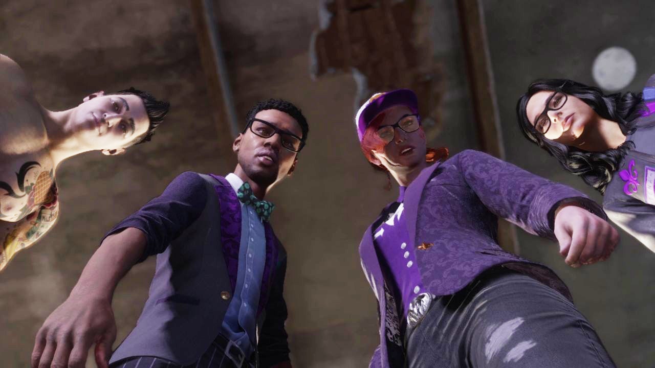 The four leaders of The Saints in Saints Row (2022) looking down on the camera, L-R Kevin, Eli, The Boss and Neena