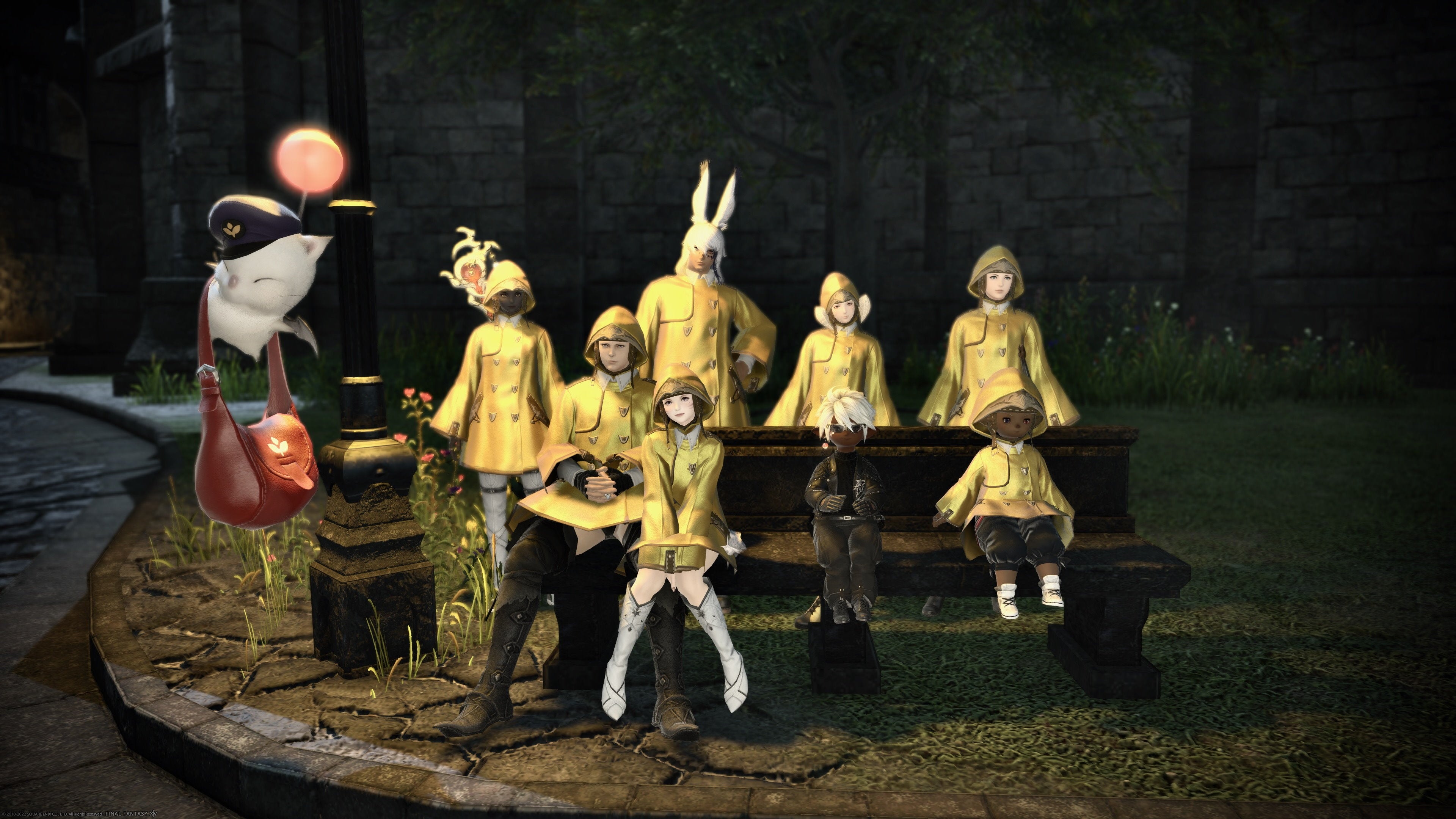 A group of Final Fantasy 14 characters wearing yellow rain coats sitting on a bench