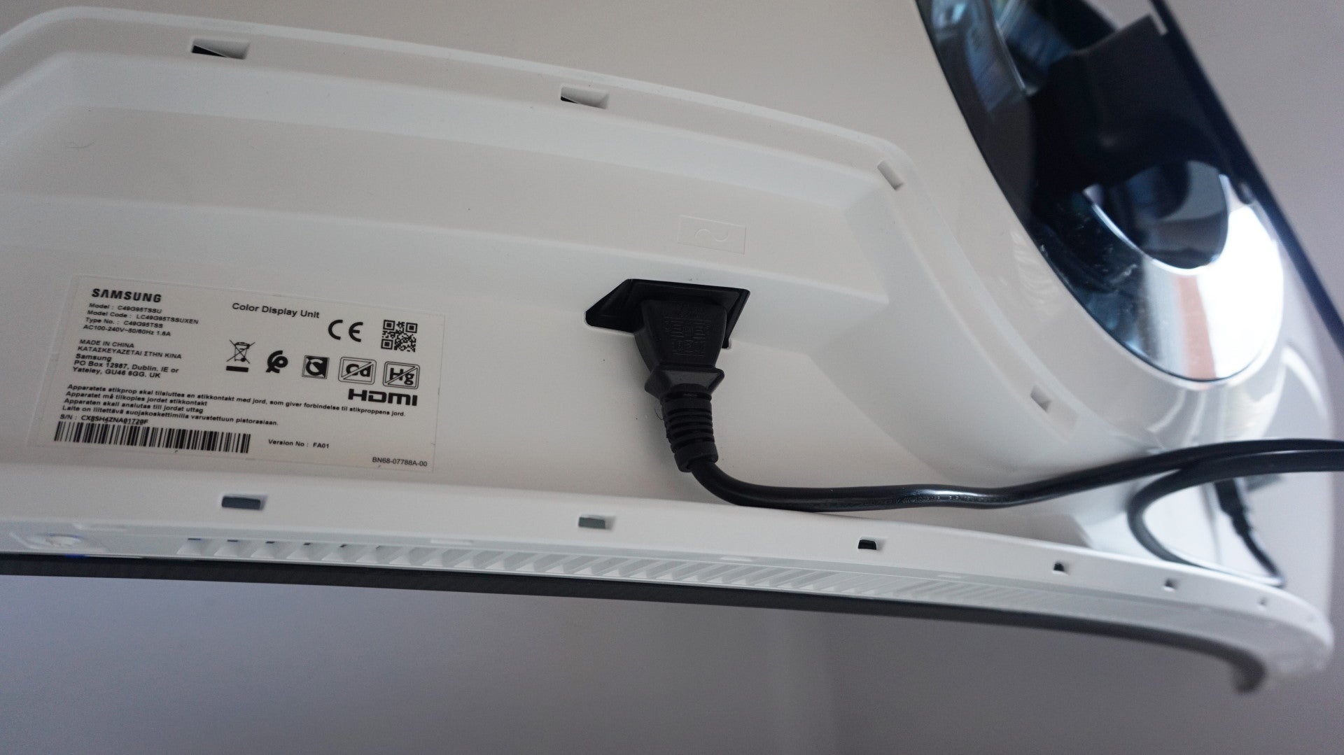 A photo of the Samsung Odyssey G9 gaming monitor's power port
