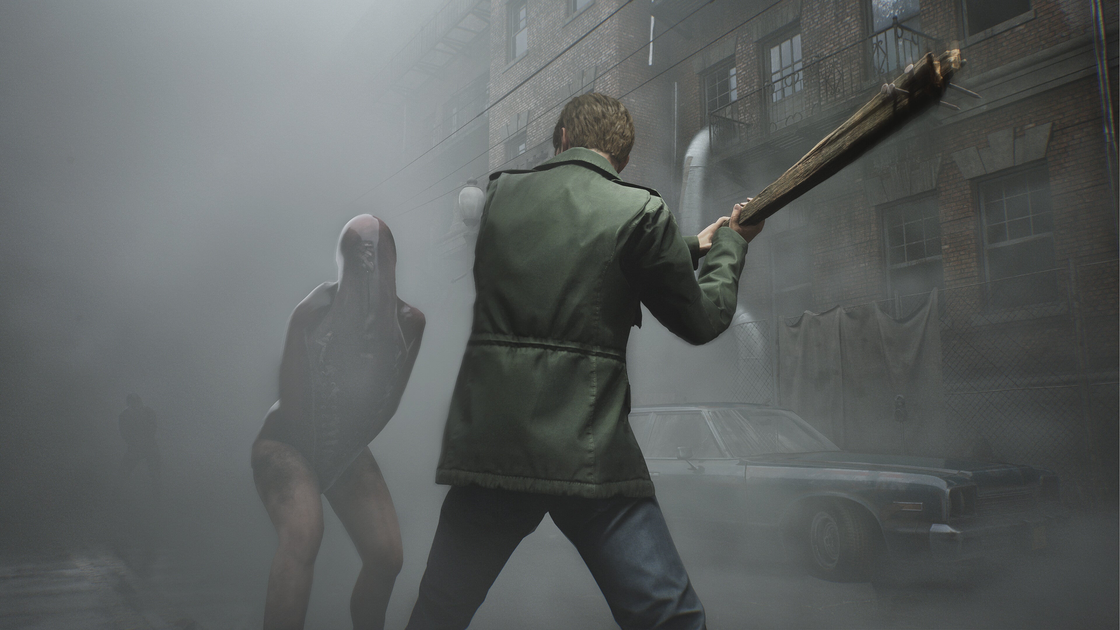 A man prepares to swing a baseball bat at an armless monster in the Silent Hill 2 remake