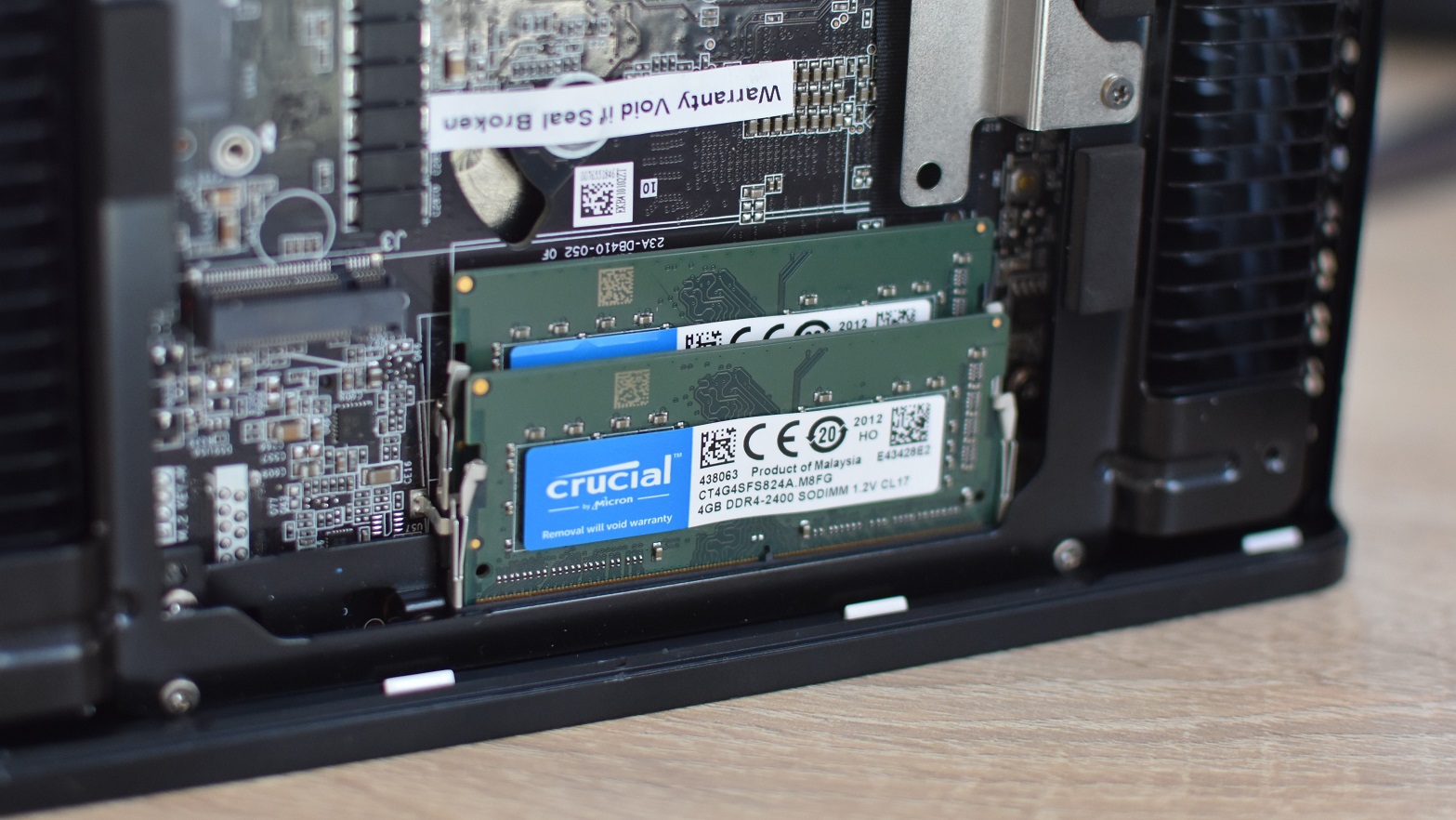 Two sticks of SO-DIMM RAM installed inside a mini-PC.
