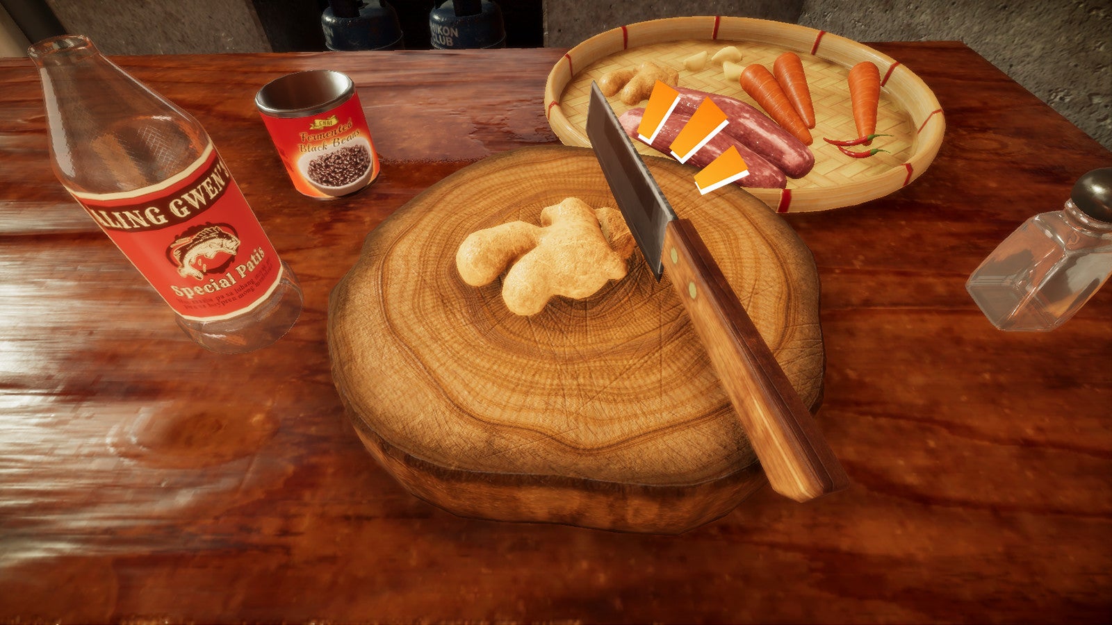 A screenshot of Soup Pot showing a wooden chopping board with ginger on top of it. A knife is cutting into the ginger. Several other ingredients are dotted around the table.