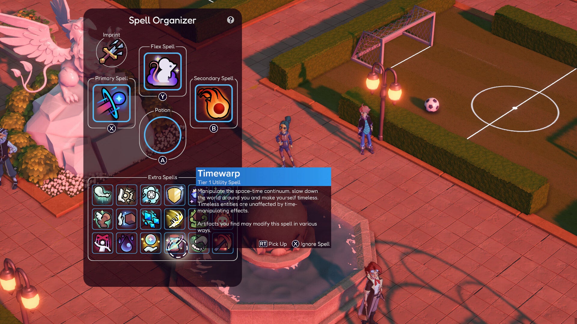 A hotbar shows a character's active spells in Spells & Secrets, against the background of an outdoor area of the school including a football pitch.