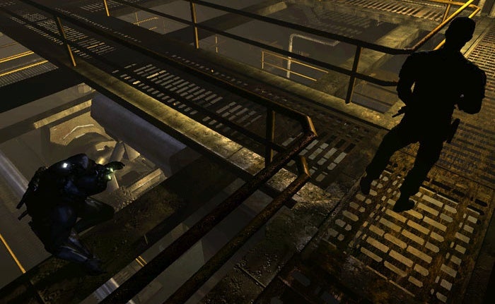 A screenshot of Splinter Cell: Chaos Theory showing Sam skulking near some gantries.