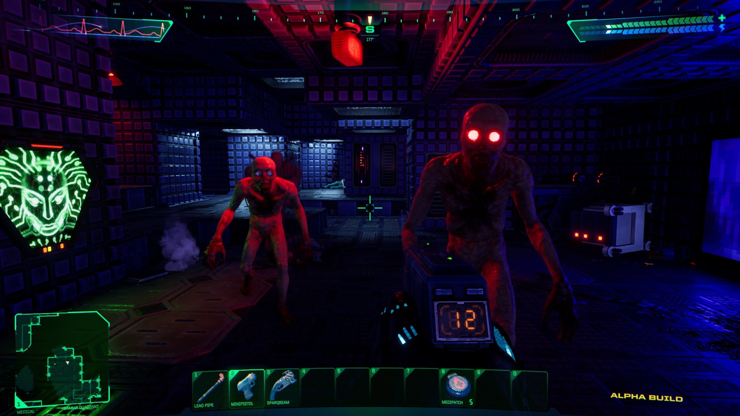 A screenshot of the System Shock remake, showing a metal corridor bathed in red light and in the foreground two zombie-like enemies rushing toward the player.