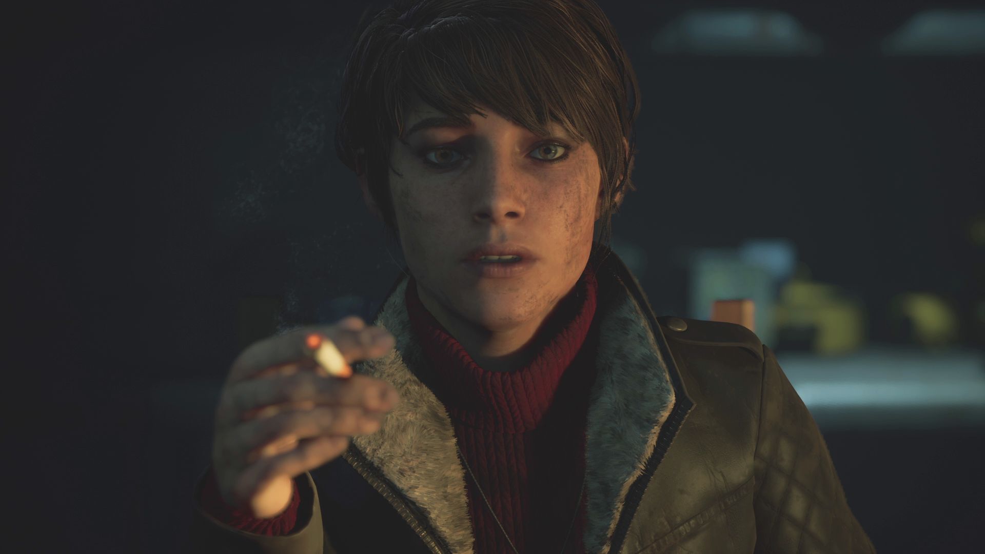 A screenshot of Mariane, the medium from The Medium. She's a young white woman with short dark hair, and is smoking a cigarette and covered in dirt.