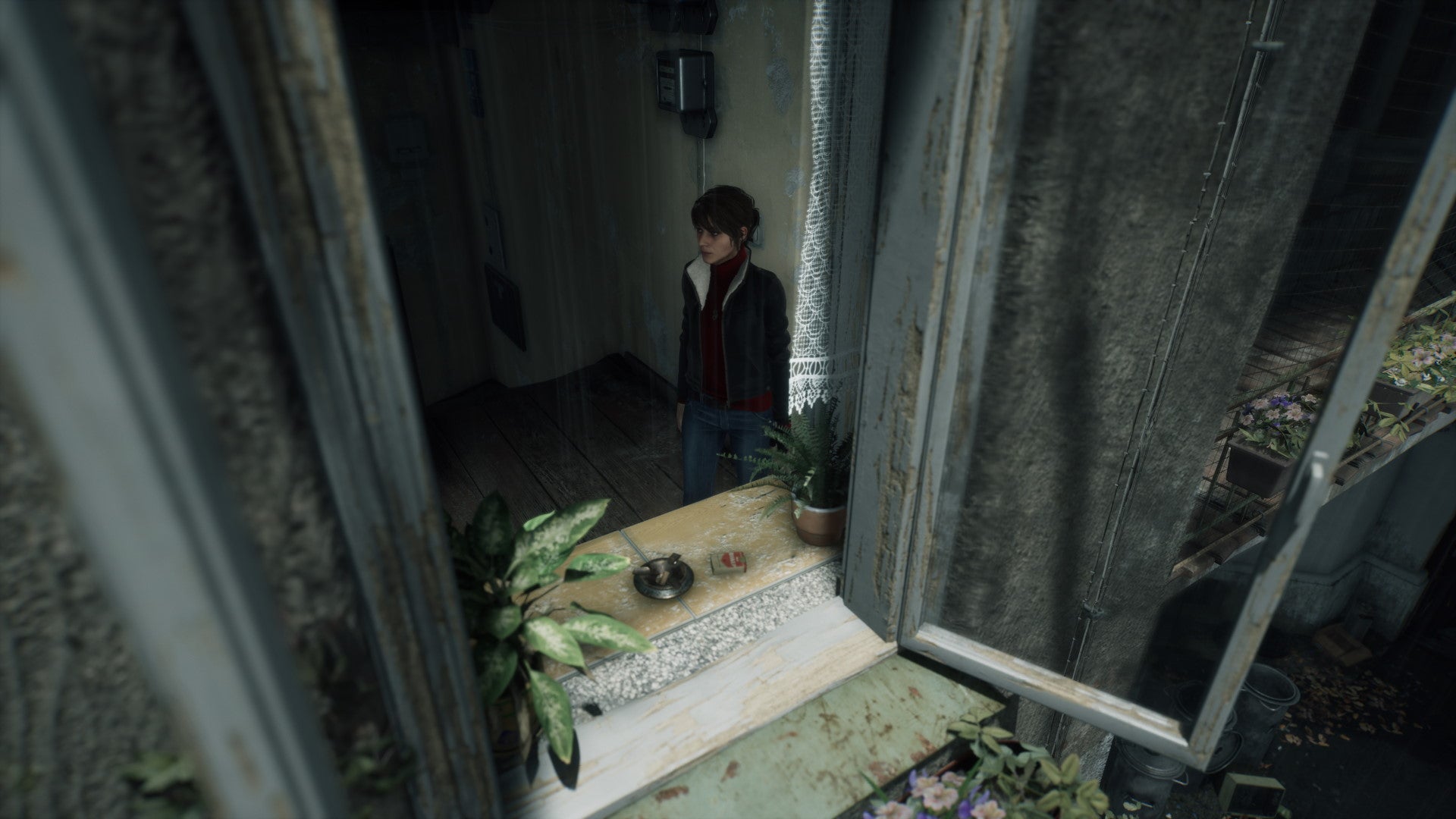 A screenshot of Marianne looking out a window in The Medium with no ray tracing effects