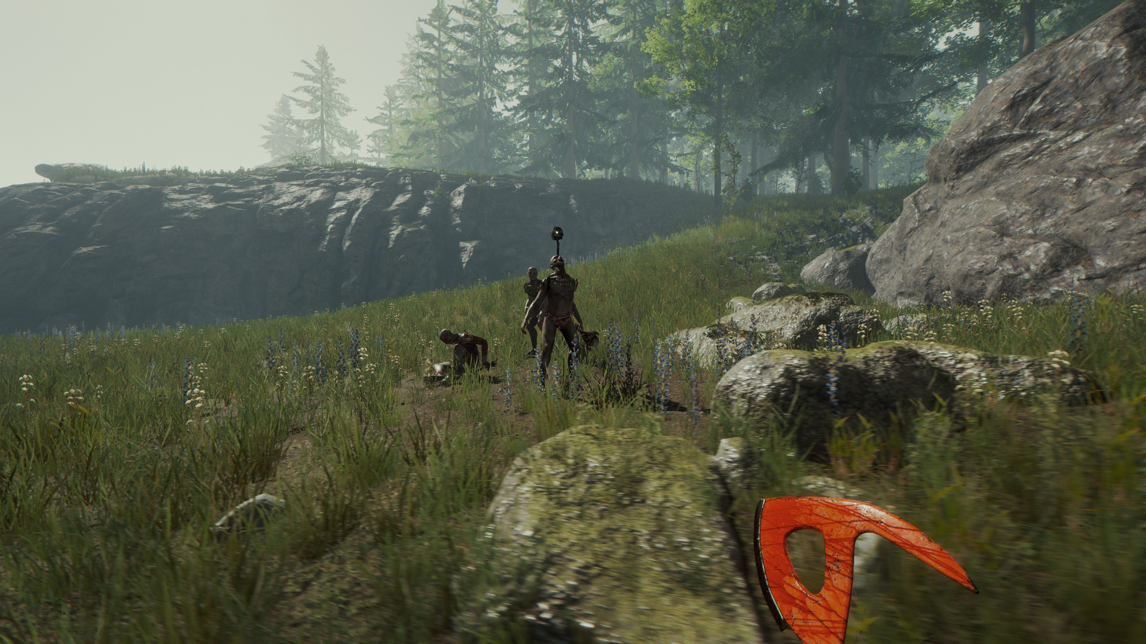The player spots three mutants in a grassy plain in The Forest