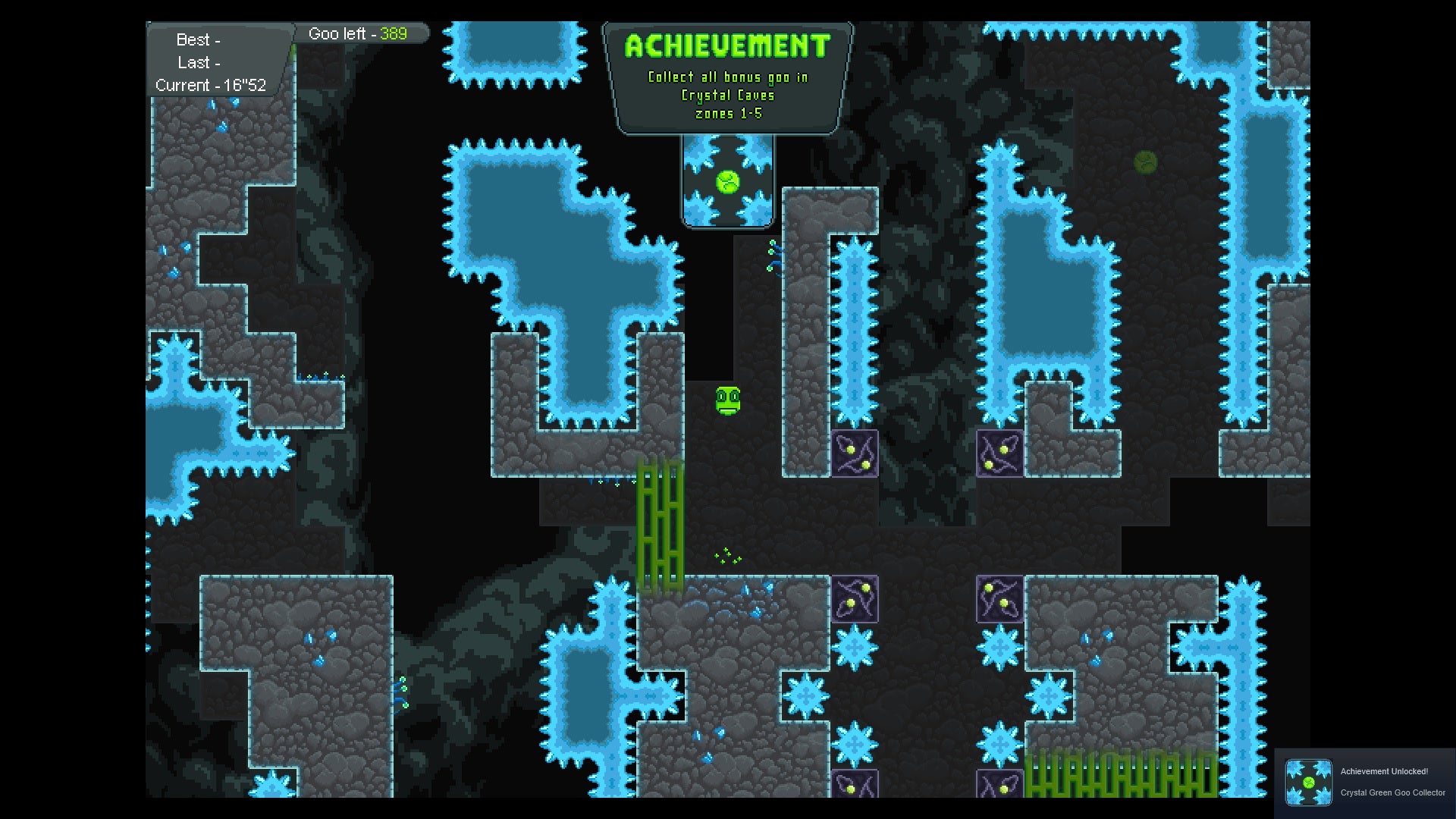 A level in The True Slime King platformer - the little green slime king is in the centre and the level itself is full of blocks of spiked ice